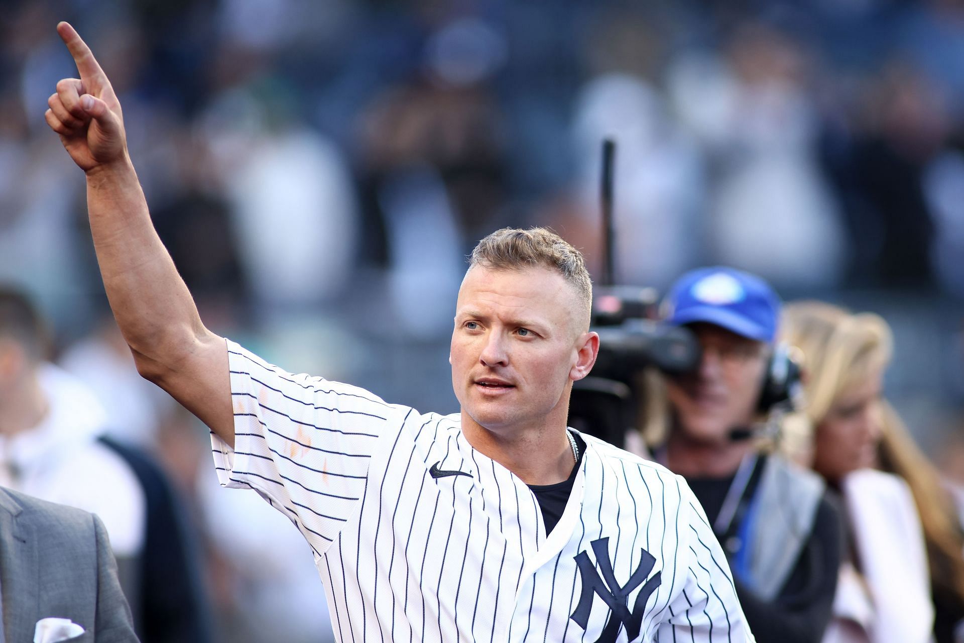 Josh Donaldson #28 of the New York Yankees celebrates after hitting a walk-off RBI single in the eleventh inning against the Boston Red Sox at Yankee Stadium on April 08, 2022 in New York City.