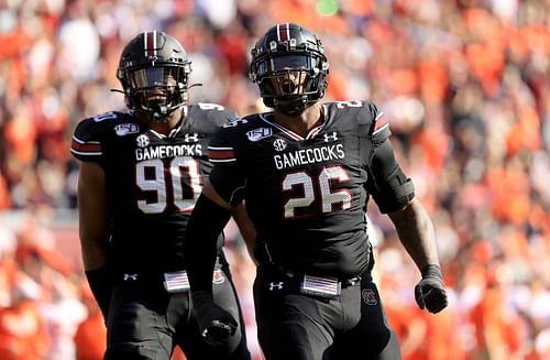 Zacch Pickens #26 of the South Carolina Gamecocks reacts after a play with teammate Rick Sandidge #90