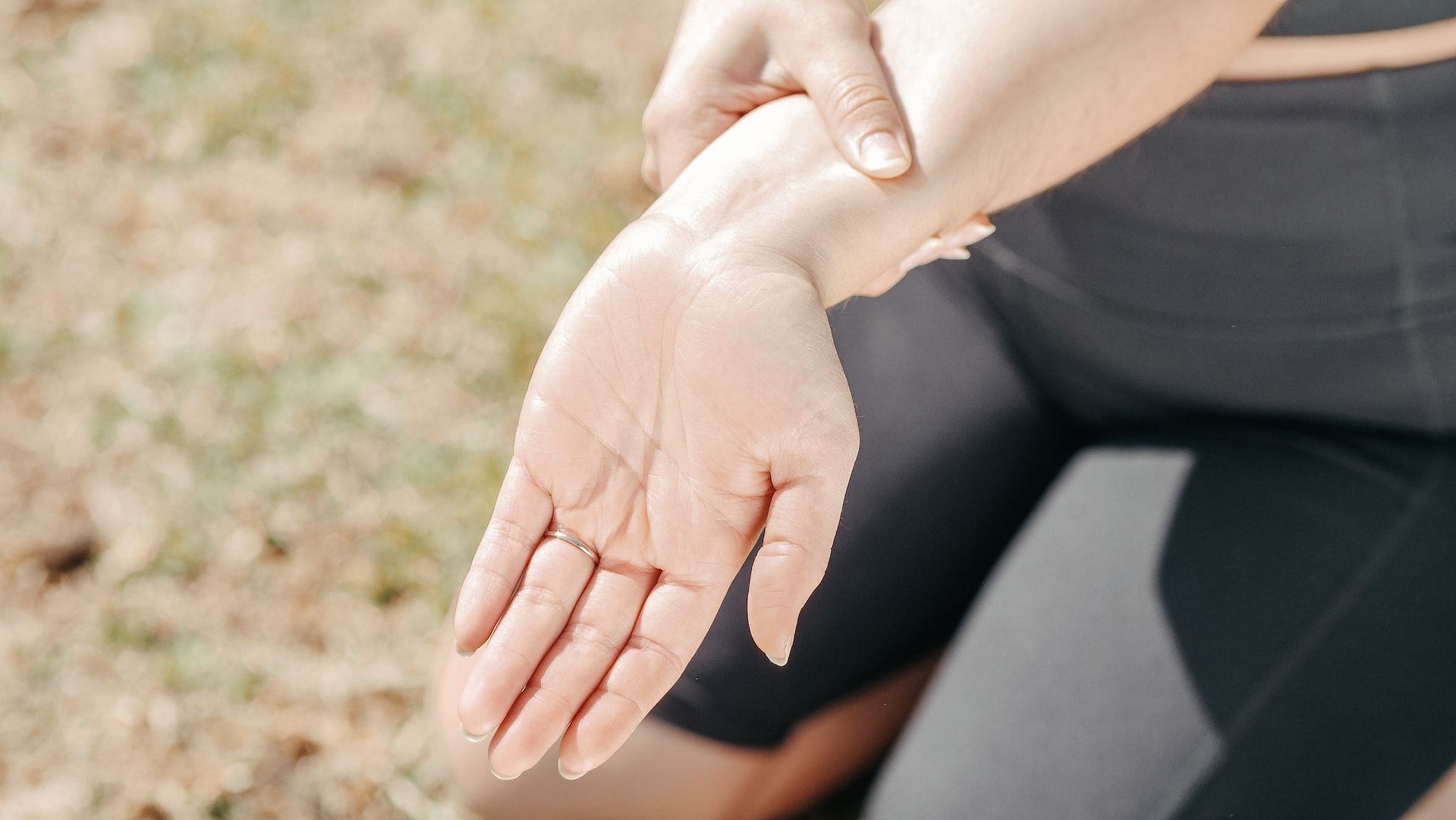 The eagle arm stretch is among the most effective wrist stretches. (Photo via Pexels/Kindel Media)