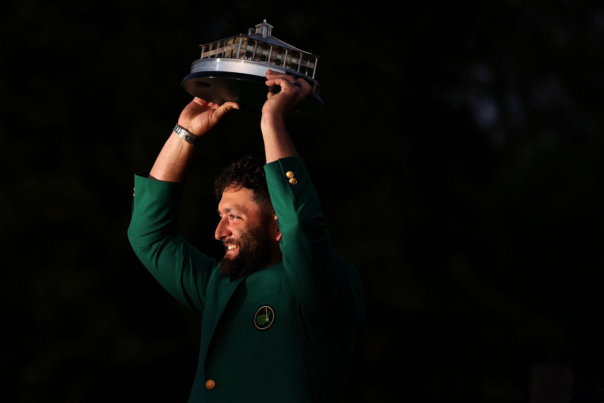 Jon Rahm lifts the trophy after winning the 2023 Masters
