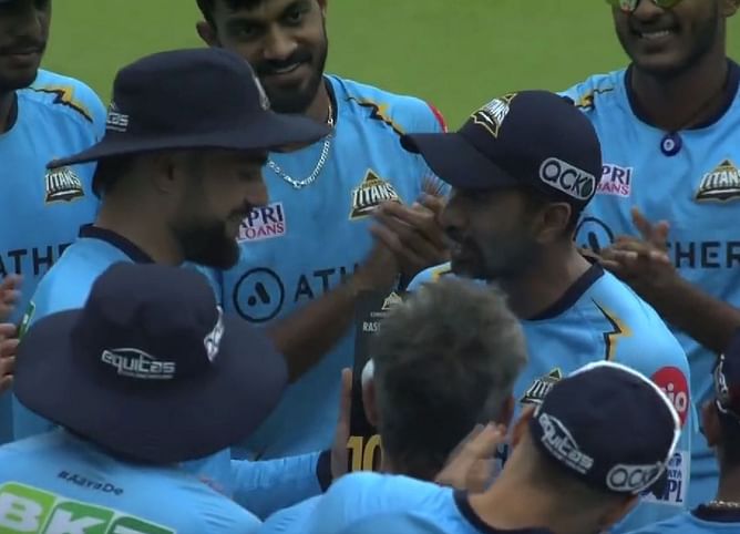 [WATCH] Rashid Khan receives a special memento in GT's team huddle on occasion of his 100th IPL appearance