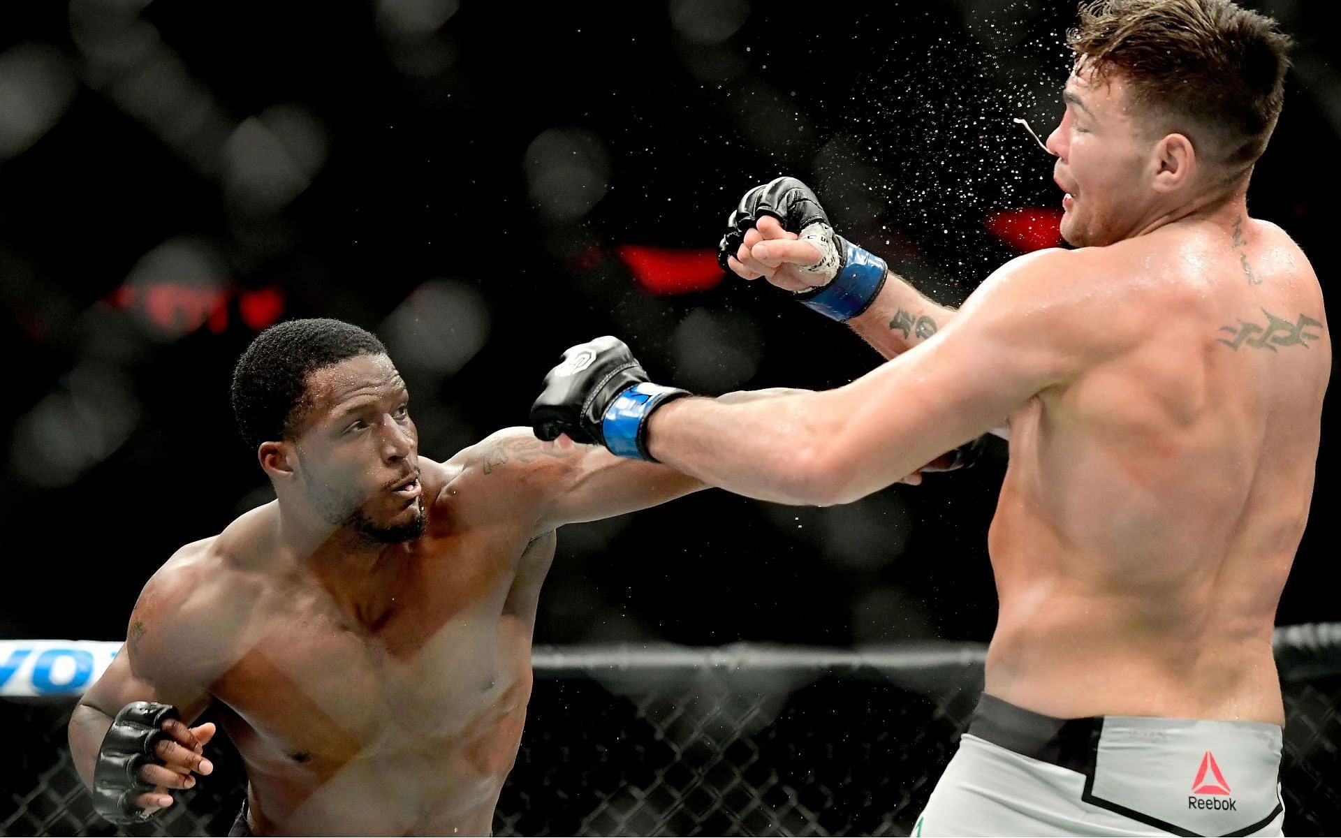Karl Roberson punches Jack Marshman in their 2018 bout [Image Credit: Getty]