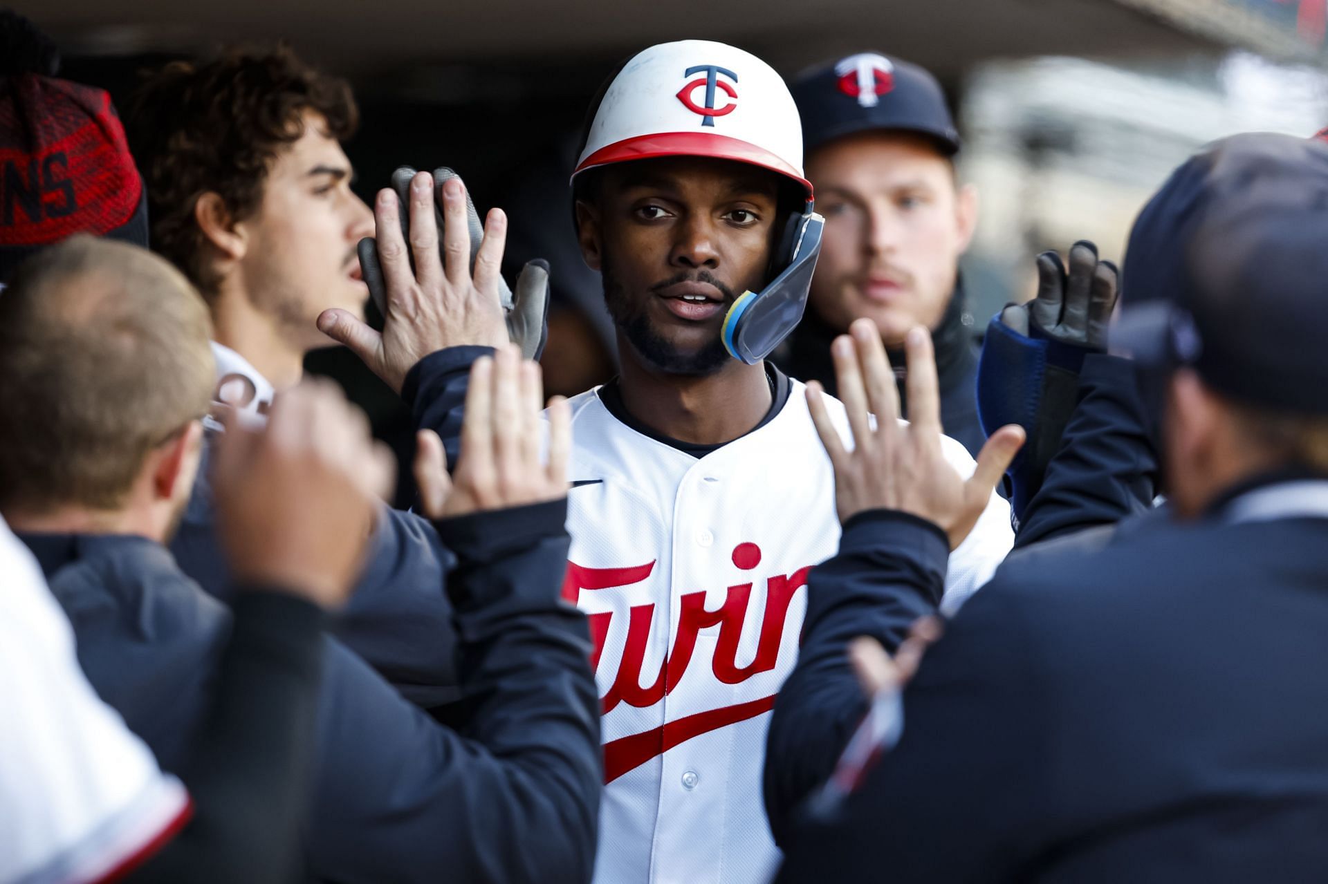 Michael A. Taylor #2 of the Minnesota Twins celebrates with teammates in the dugout