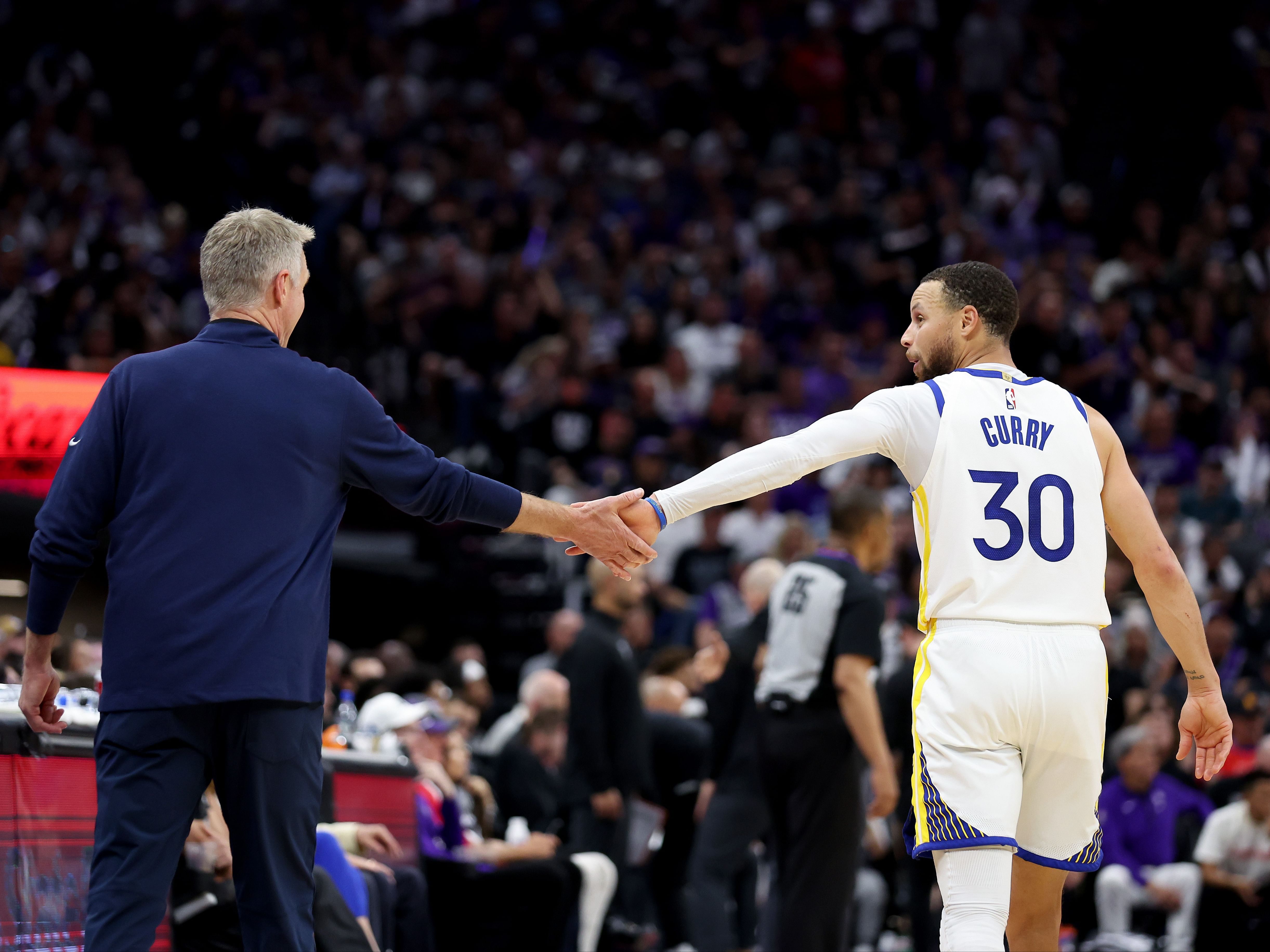 Golden State Warriors coach Steve Kerr and star player Steph Curry