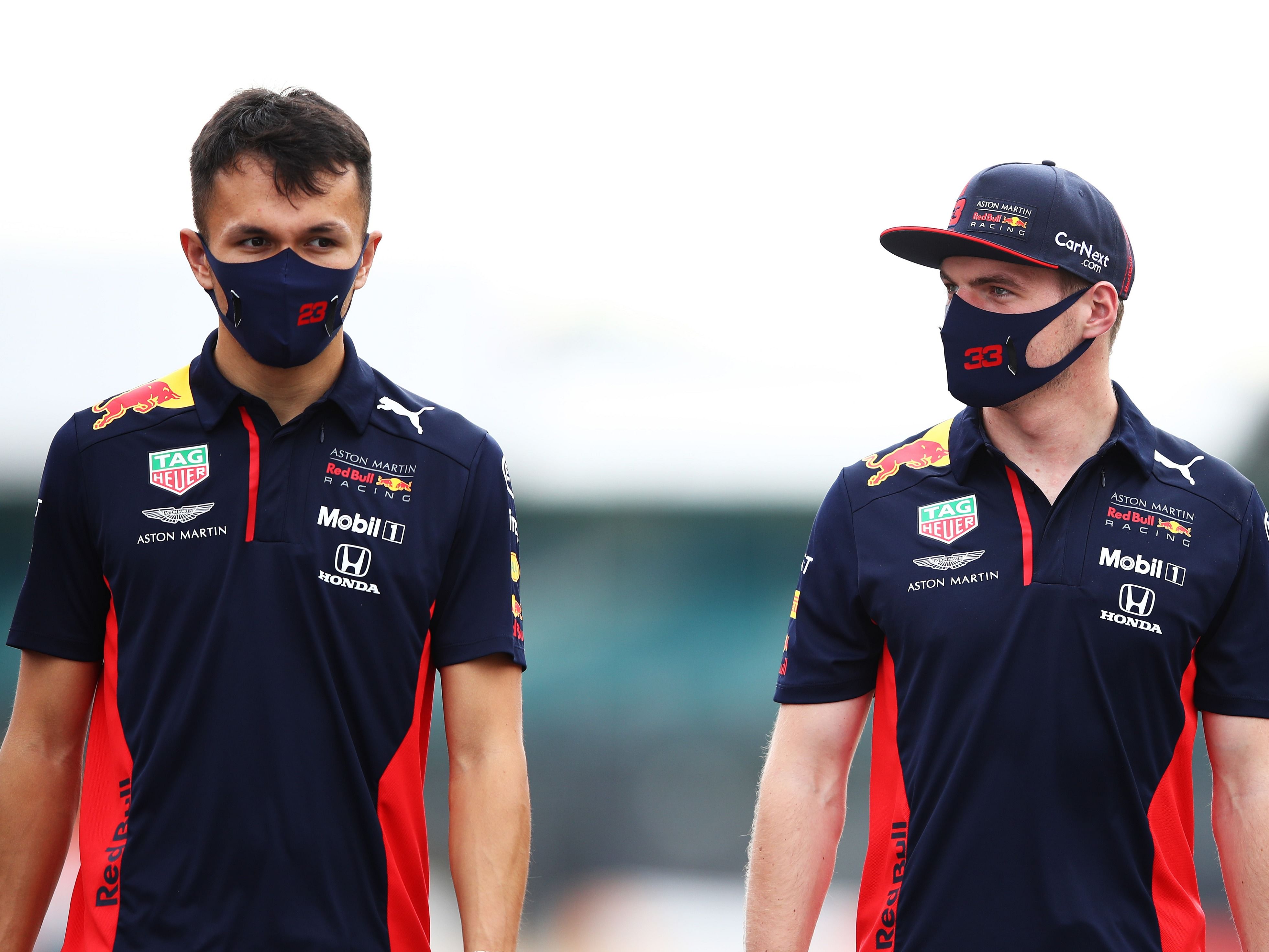 Max Verstappen and Alexander Albon walk the track during previews ahead of the 2020 F1 70th Anniversary British Grand Prix. (Photo by Mark Thompson/Getty Images)