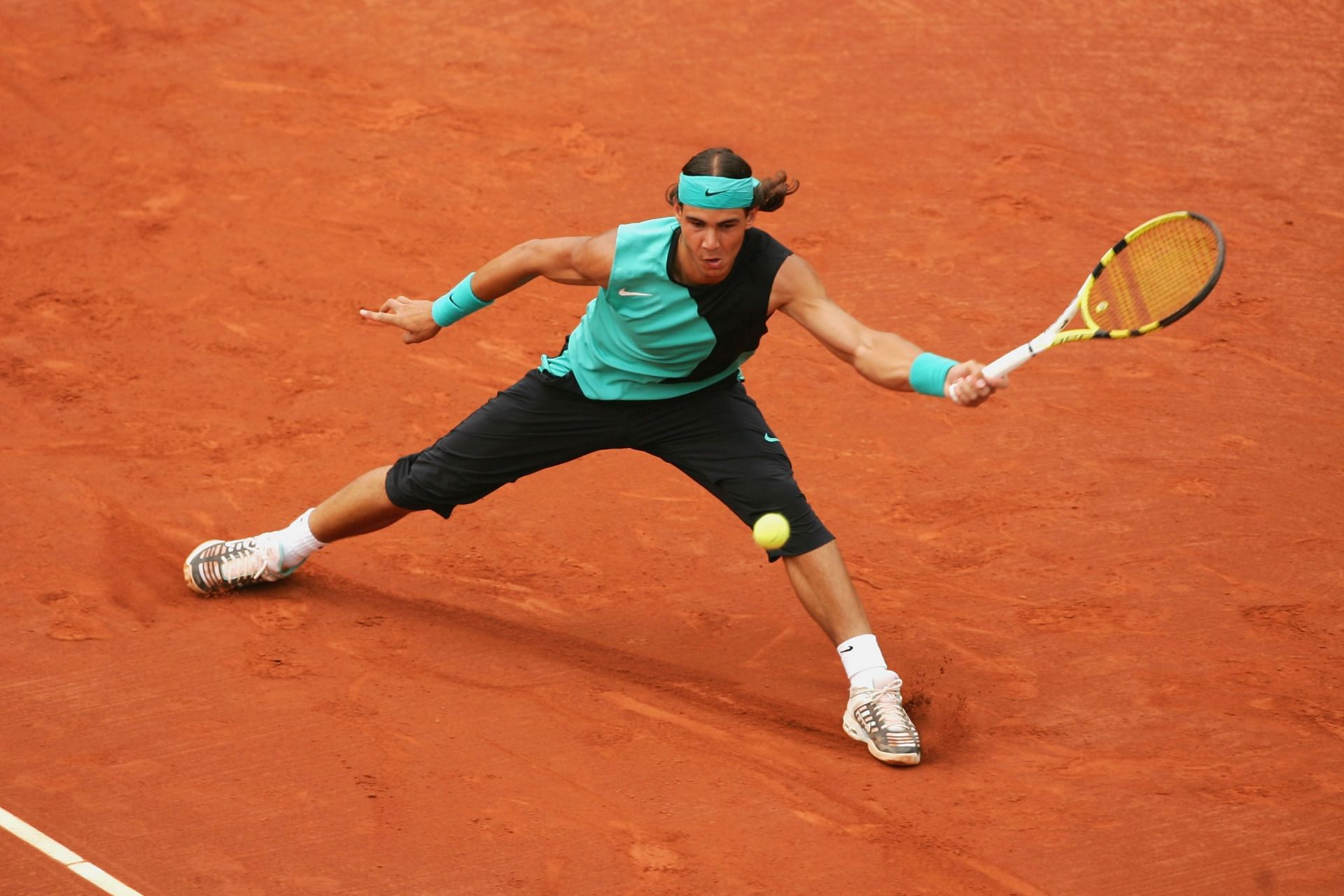 Nadal playing against Thomas Johansson at the Open Seat Godo in 2007.