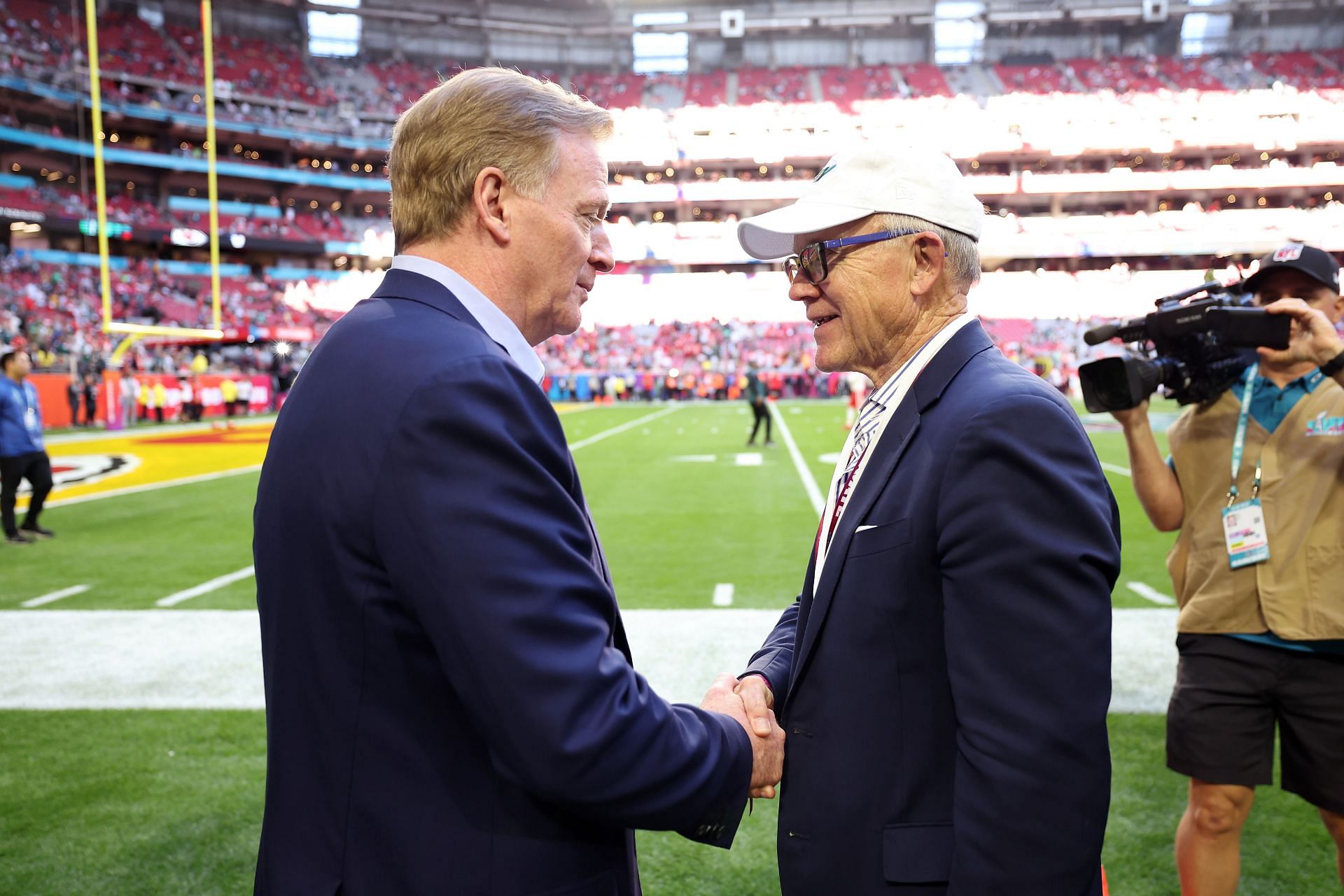 Jets owner Woody Johnson and Roger Goodell at Super Bowl LVII