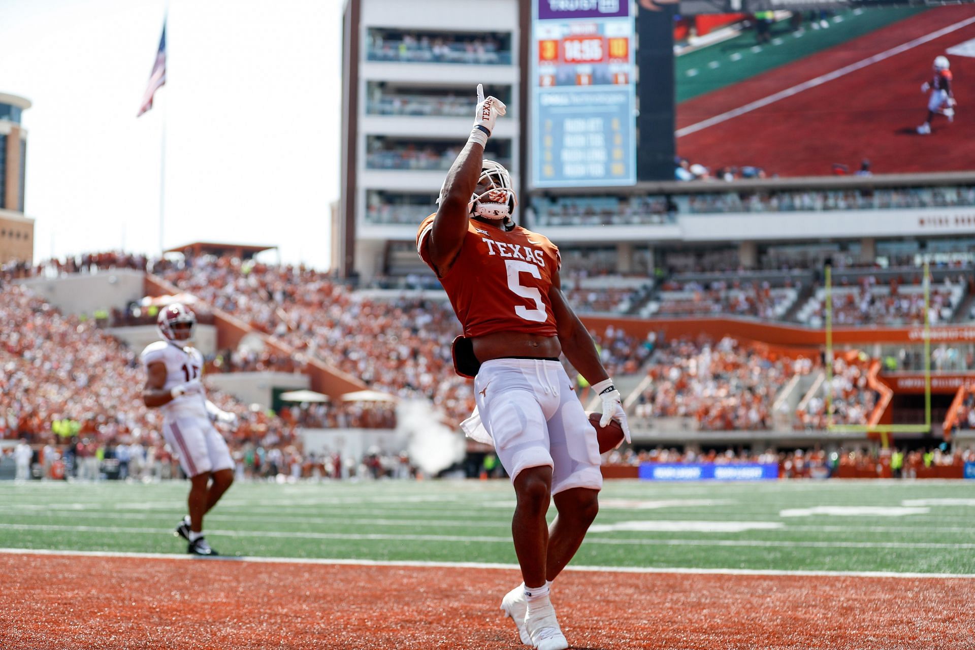 Bijan Robinson #5 of the Texas Longhorns scores a touchdown in the second quarter against the Alabama Crimson Tide