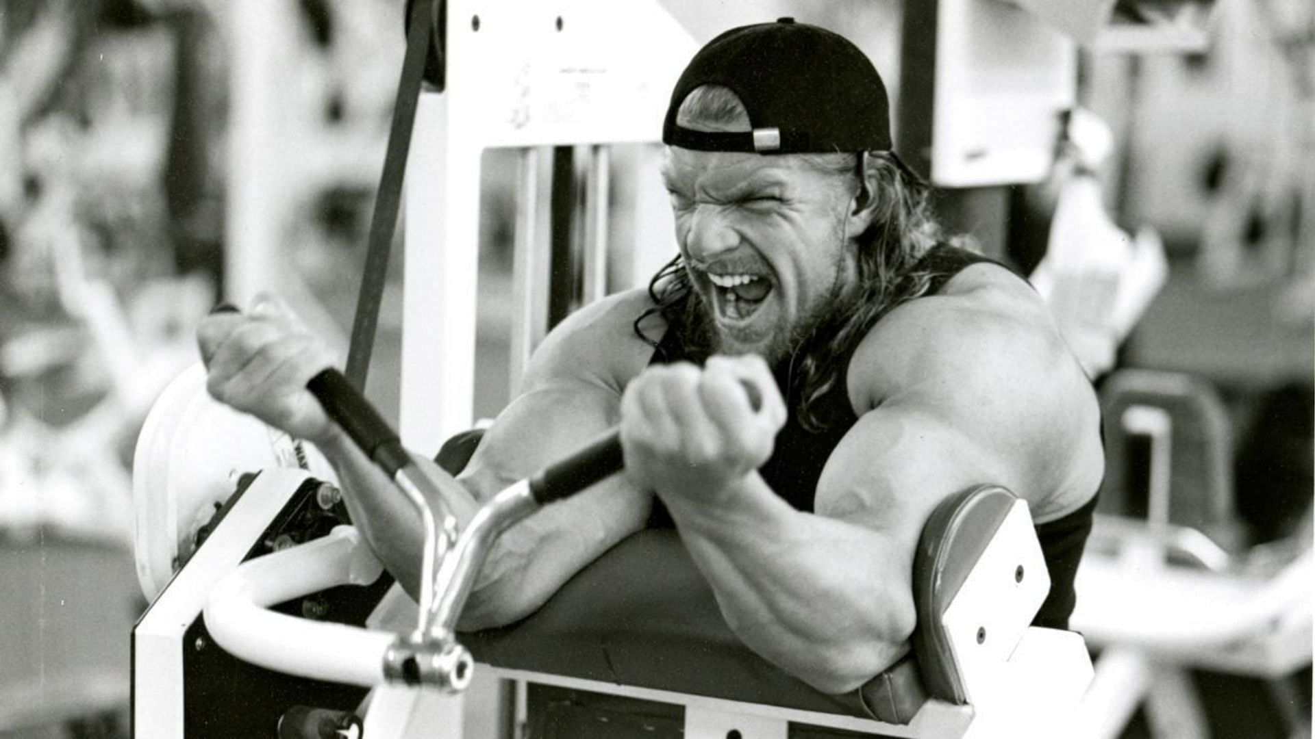 Preacher curls should be used to add variety to your arm workout. (Image via Pxfuel)
