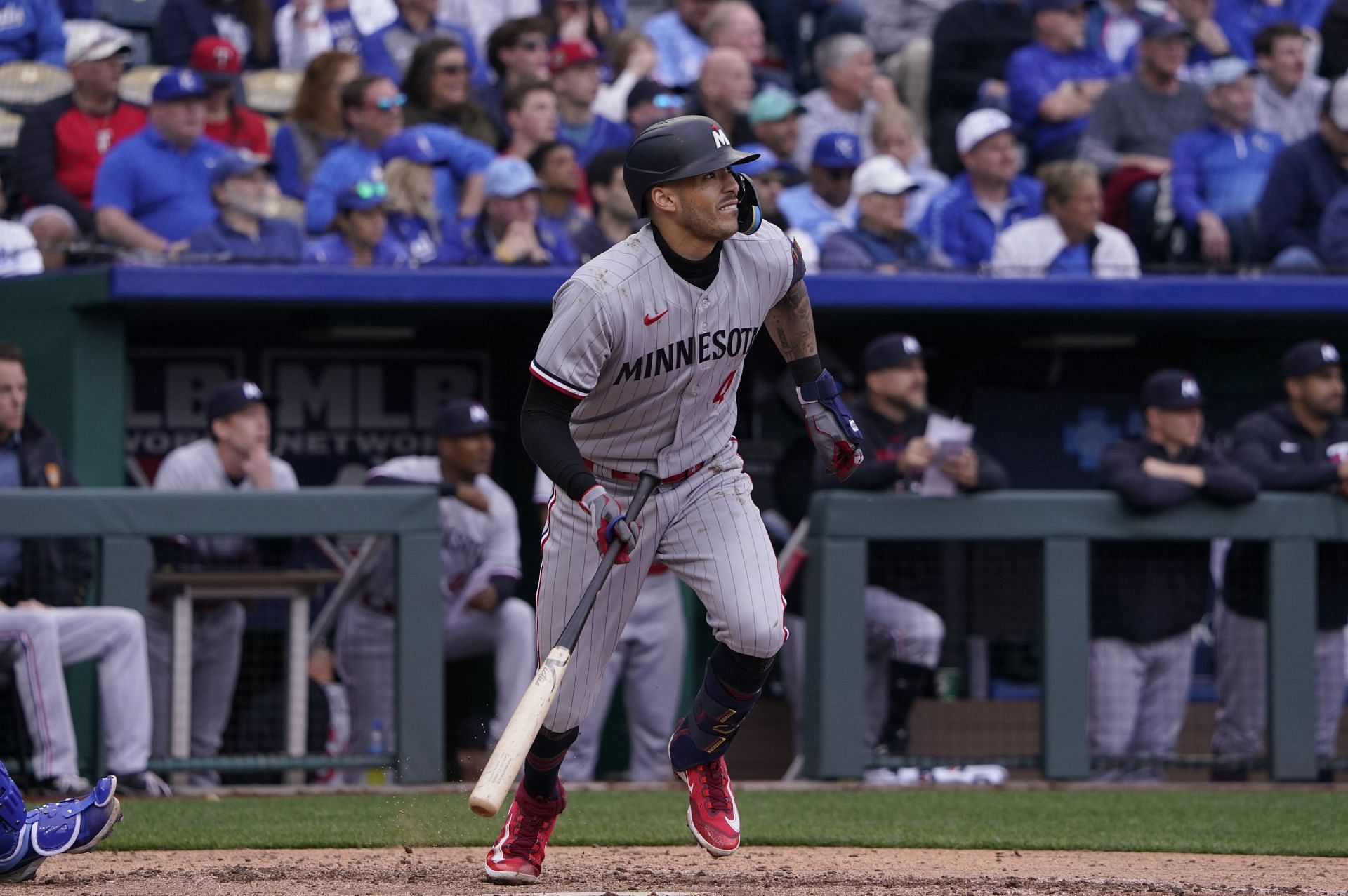 Carlos Correa of the Minnesota Twins runs out a pop fly out against the Kansas City Royals on Opening Day at Kauffman Stadium