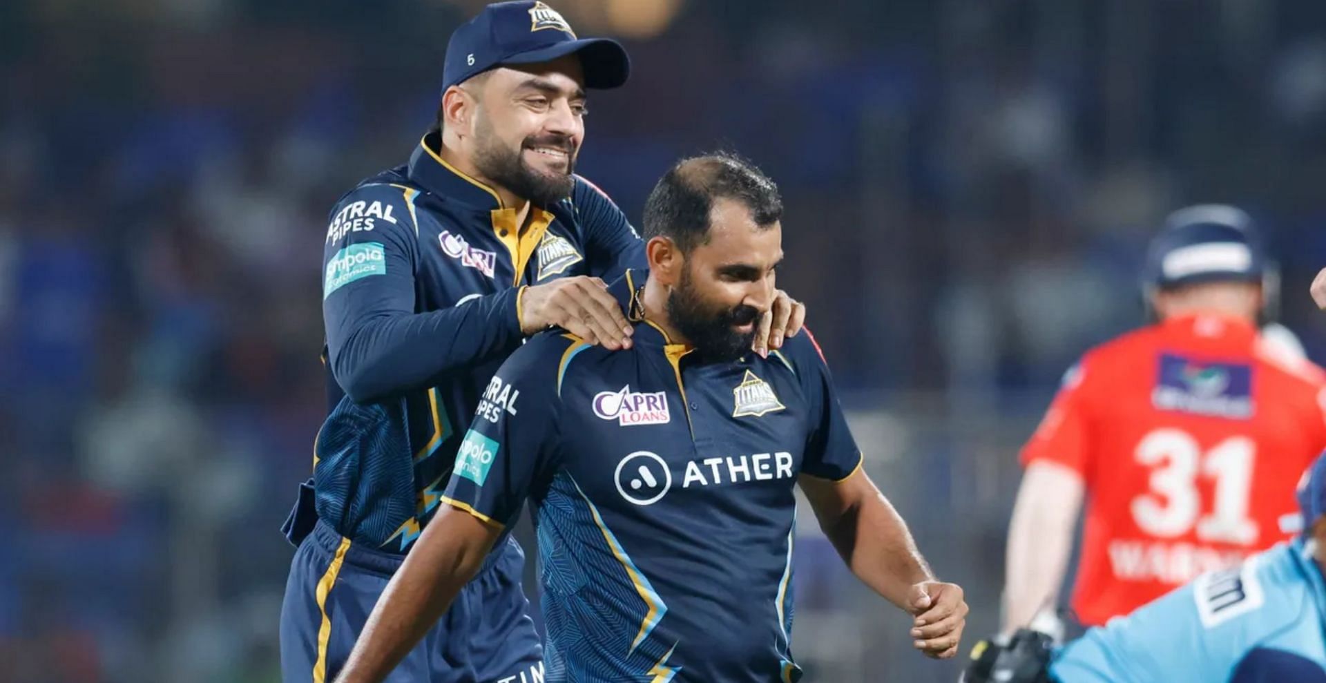Mohammad Shami (R) and Rashid Khan starred with the ball for the Gujarat Titans. [P/C: iplt20.com]