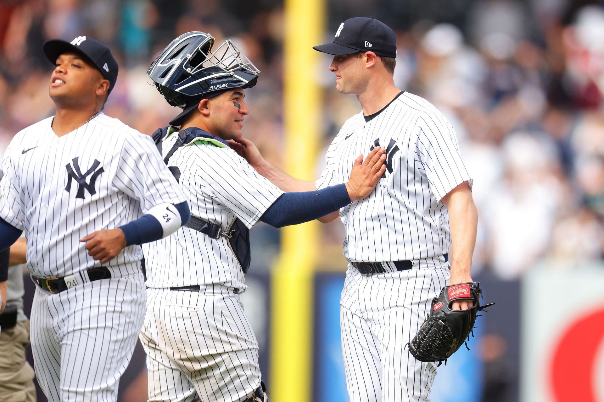 Gerrit Cole, right, of the New York Yankees celebrates with Jose Trevino after pitching a complete game shutout against the Minnesota Twins.