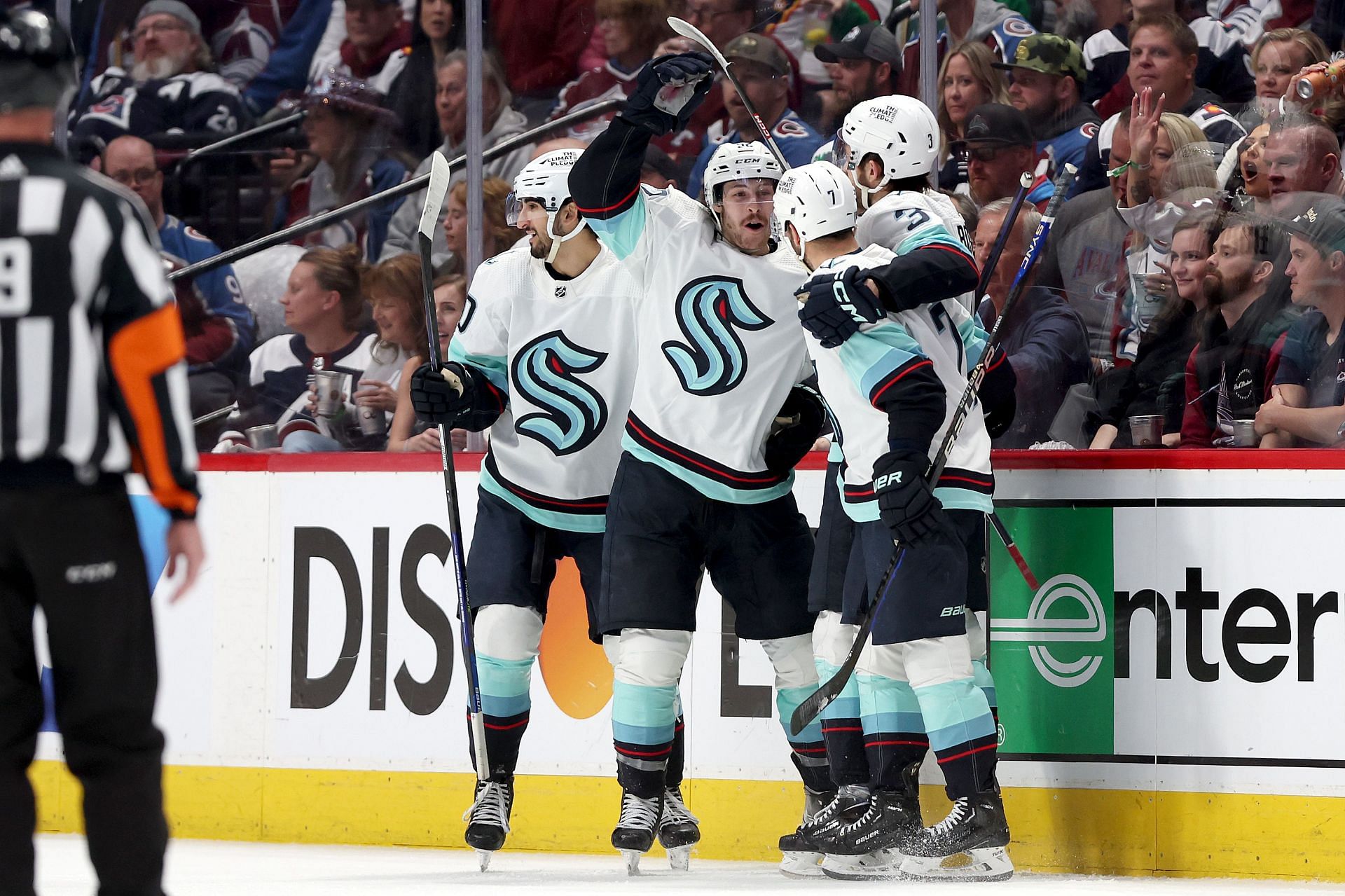 Tye Kartye #52 of the Seattle Kraken celebrates with Matty Beniers #10, Will Borgen #3, and Jordan Eberle 7 after scoring against the Colorado Avalanche in the second period during Game Five of the First Round of the 2023 Stanley Cup Playoffs at Ball Arena on April 26, 2023 in Denver, Colorado. (Photo by Matthew Stockman/Getty Images)
