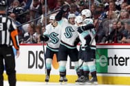 Tye Kartye #52 of the Seattle Kraken celebrates with Matty Beniers #10, Will Borgen #3, and Jordan Eberle 7 after scoring against the Colorado Avalanche in the second period during Game Five of the First Round of the 2023 Stanley Cup Playoffs at Ball Arena on April 26, 2023 in Denver, Colorado. (Photo by Matthew Stockman/Getty Images)