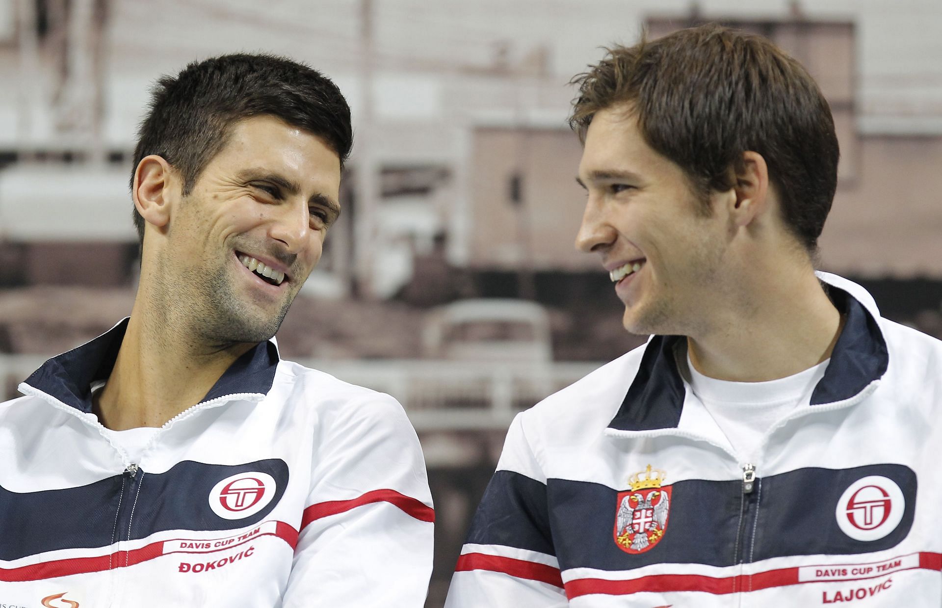 Novak Djokovic (L) and Dusan Lajovic