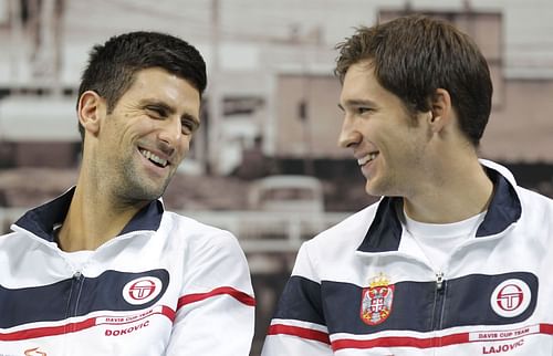 Novak Djokovic (L) and Dusan Lajovic