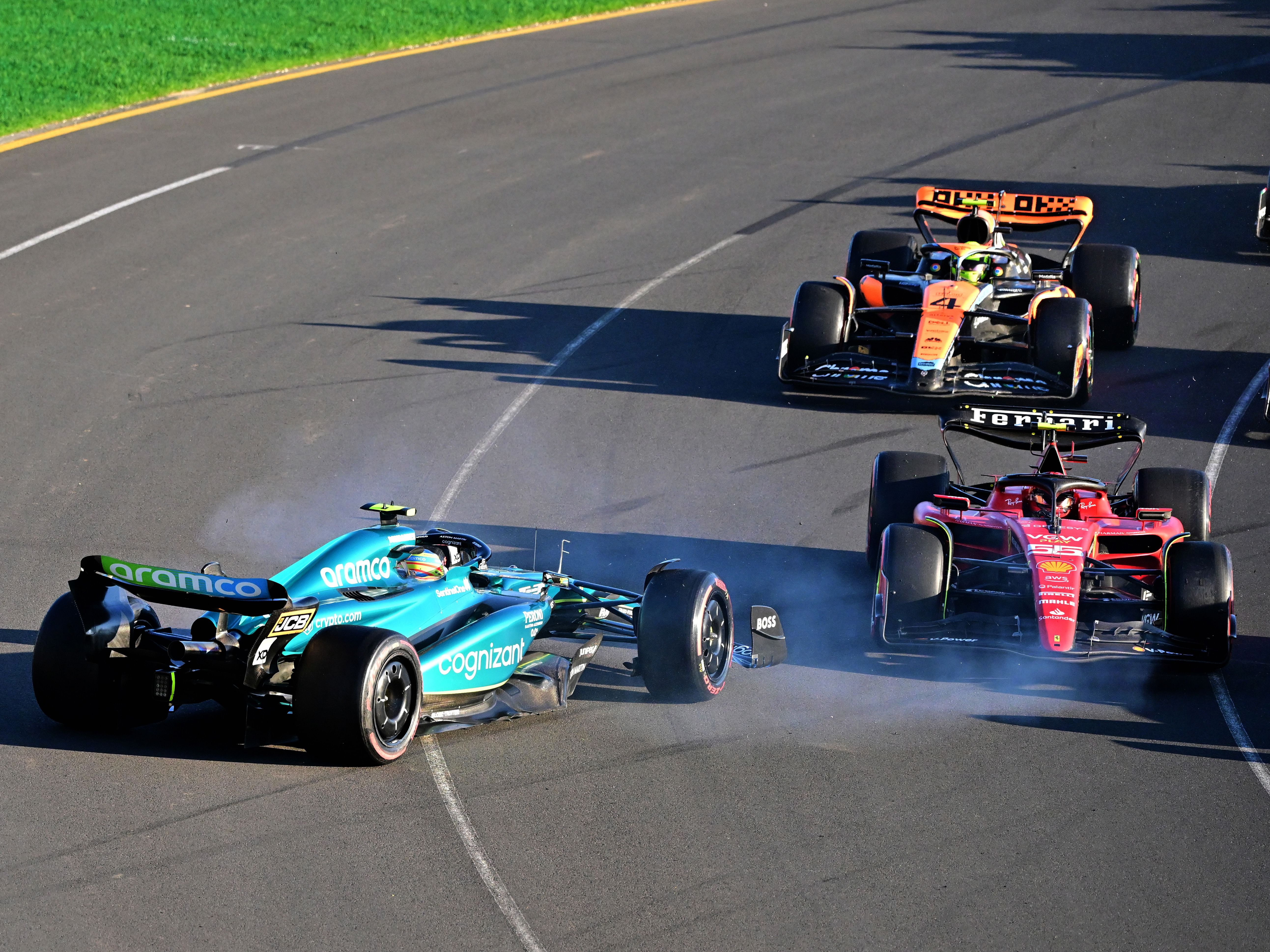 Fernando Alonso (14) spins after a collision with Carlos Sainz (55) at the second restart during the 2023 F1 Australian Grand Prix. (Photo by Peter van Egmond/Getty Images)