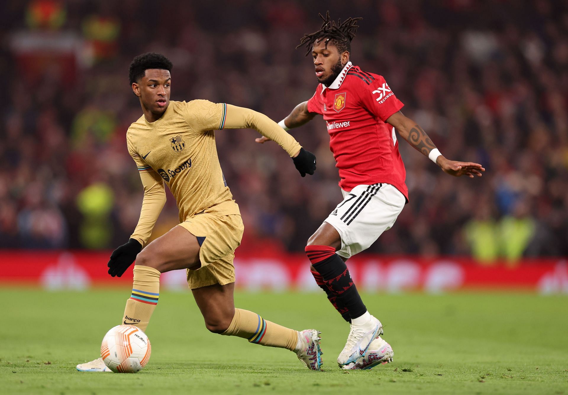 Fred (right) put in a masterclass performance against Barcelona.