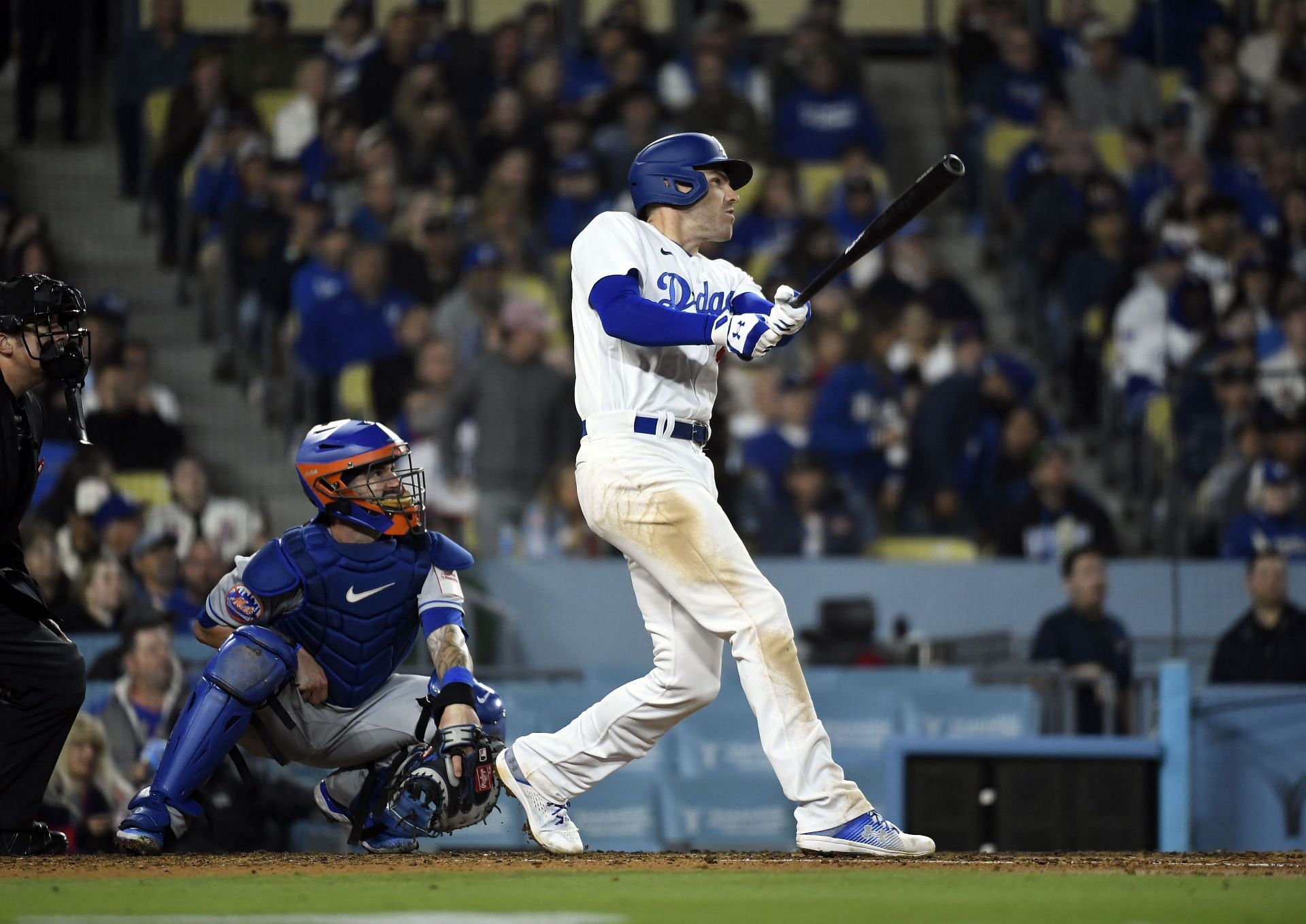 Freddie Freeman #5 of the Los Angeles Dodgers hits a two run home run to score Mookie Betts against the New York Mets at Dodger Stadium on April 17, 2023 (Photo by Kevork Djansezian/Getty Images)