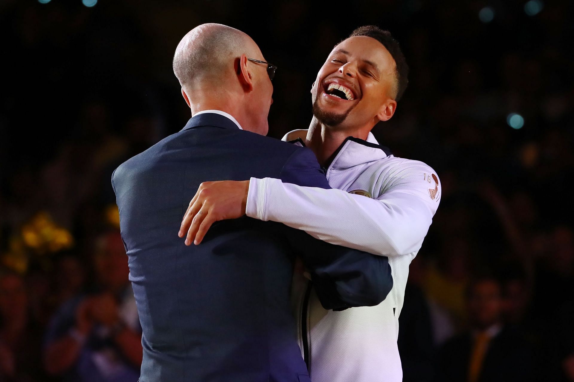 Adam Silver and Steph Curry (right)