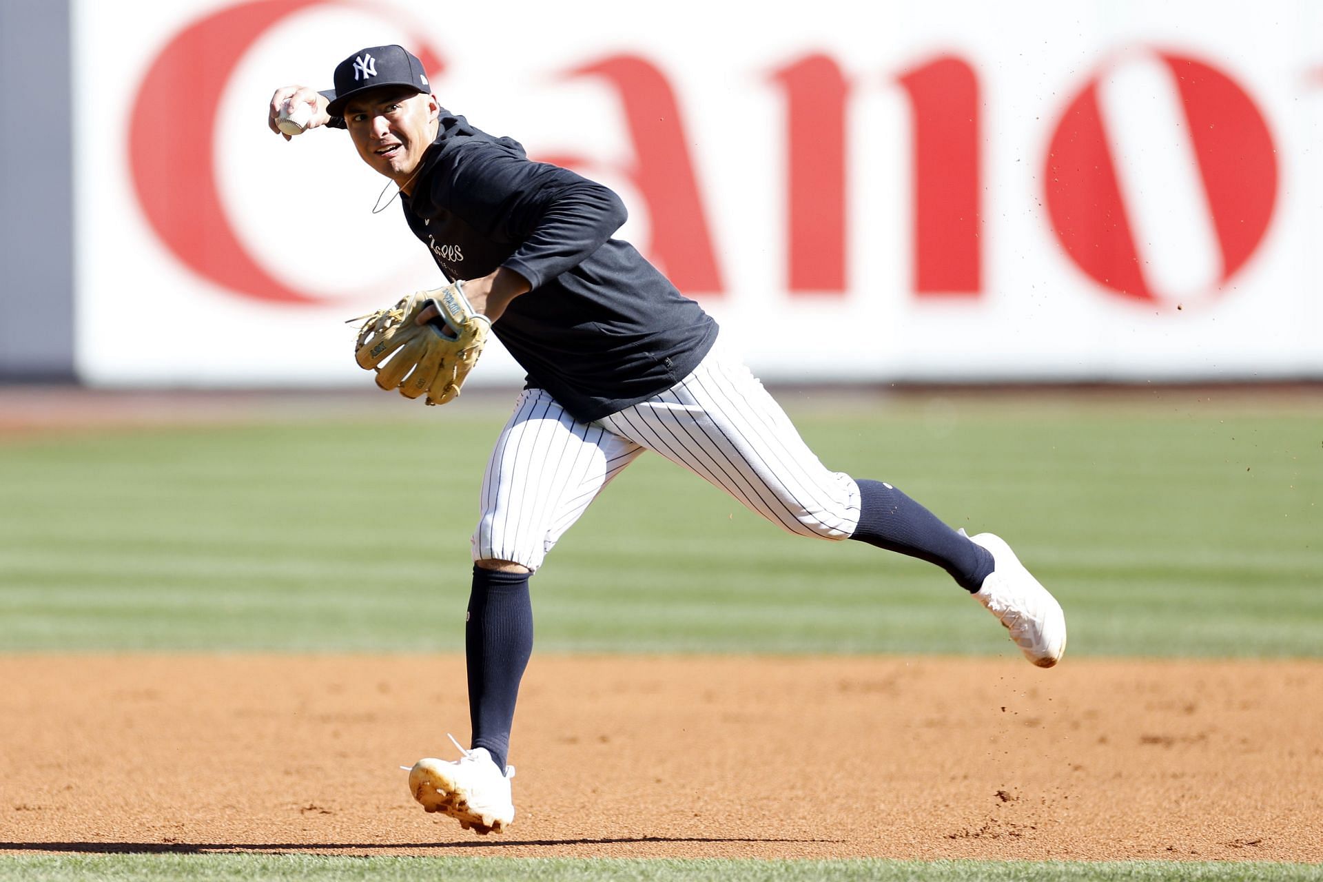 Anthony Volpe #11 of the New York Yankees takes batting practice prior to the game against the San Francisco Giants on Opening Day at Yankee Stadium on March 30, 2023 in the Bronx borough of New York City. Volpe is making his MLB