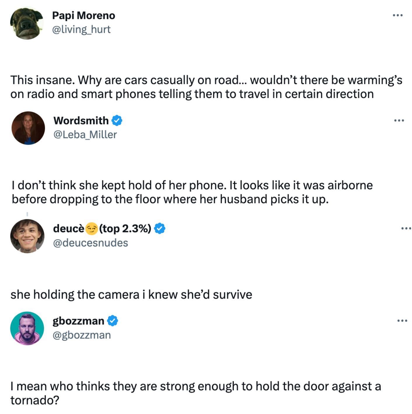 Social media users react to the video of a woman standing in front of a glass door, recording the storm (Image via Twitter)