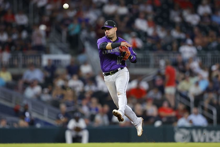 Miami Marlins shortstop Jose Iglesias throws to first during a