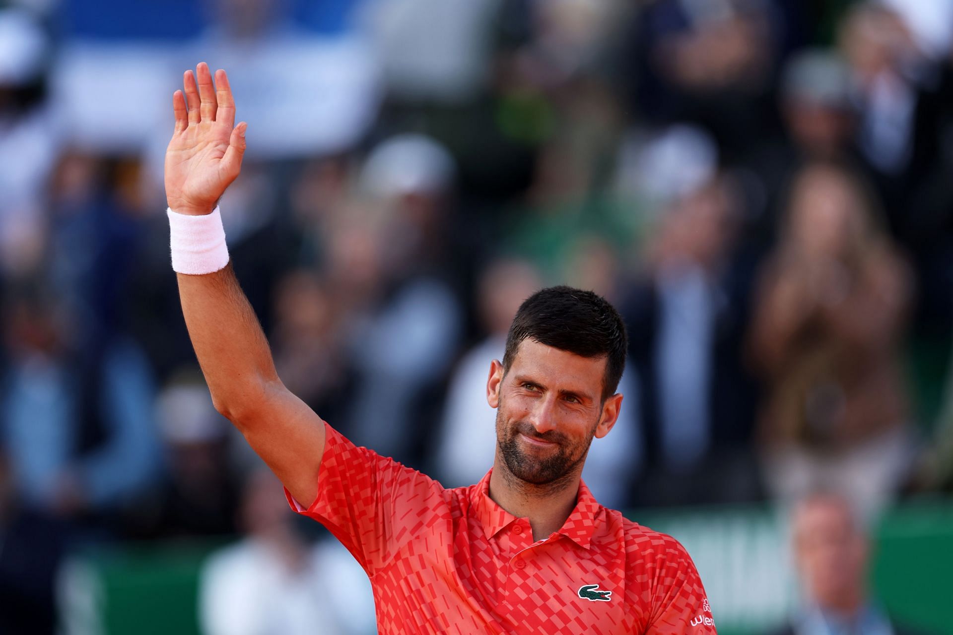 Novak Djokovic celebrates his opening match win at 2023 Rolex Monte-Carlo Masters.