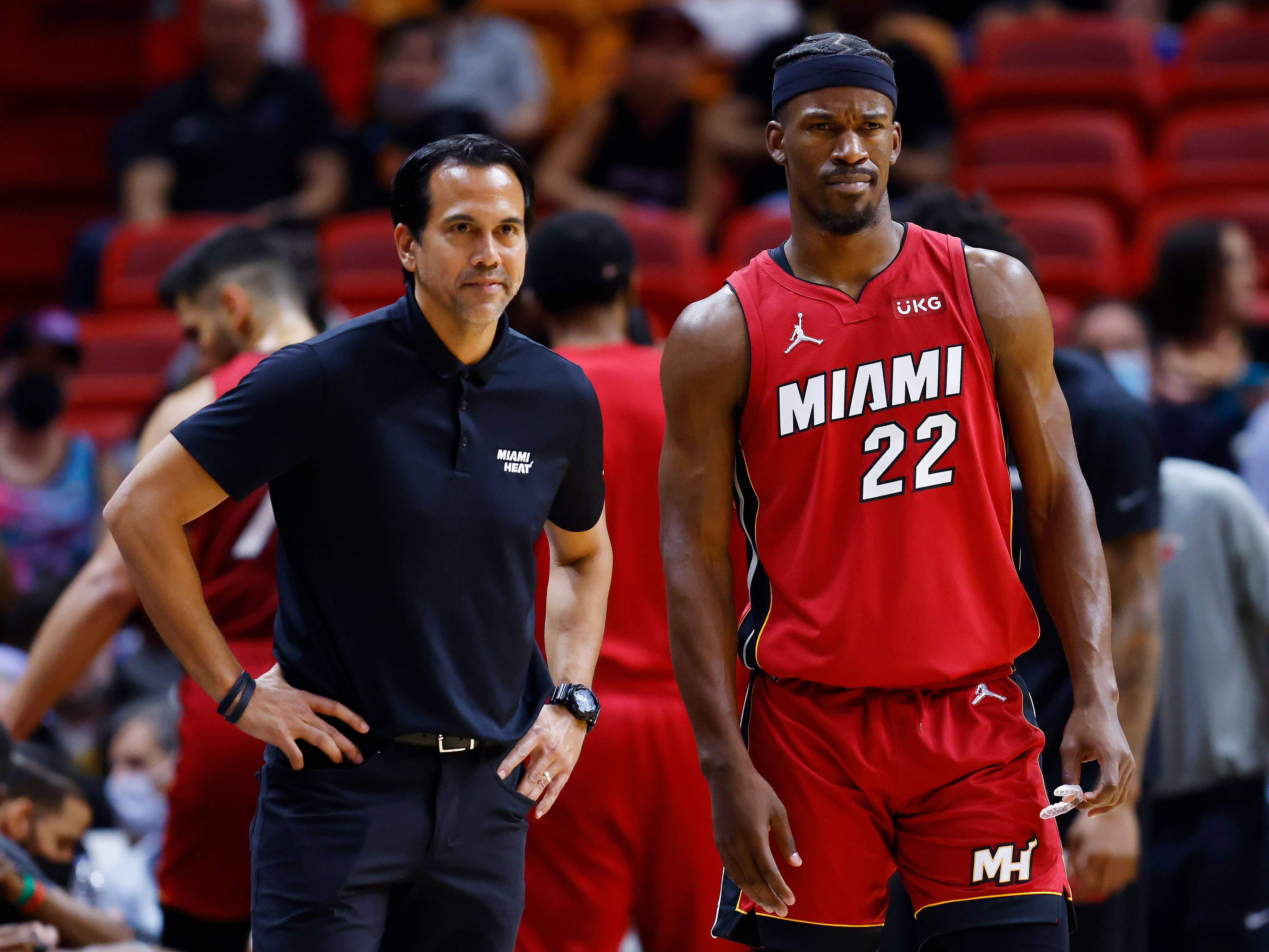 Miami Heat coach Erik Spoelstra and Jimmy Butler 