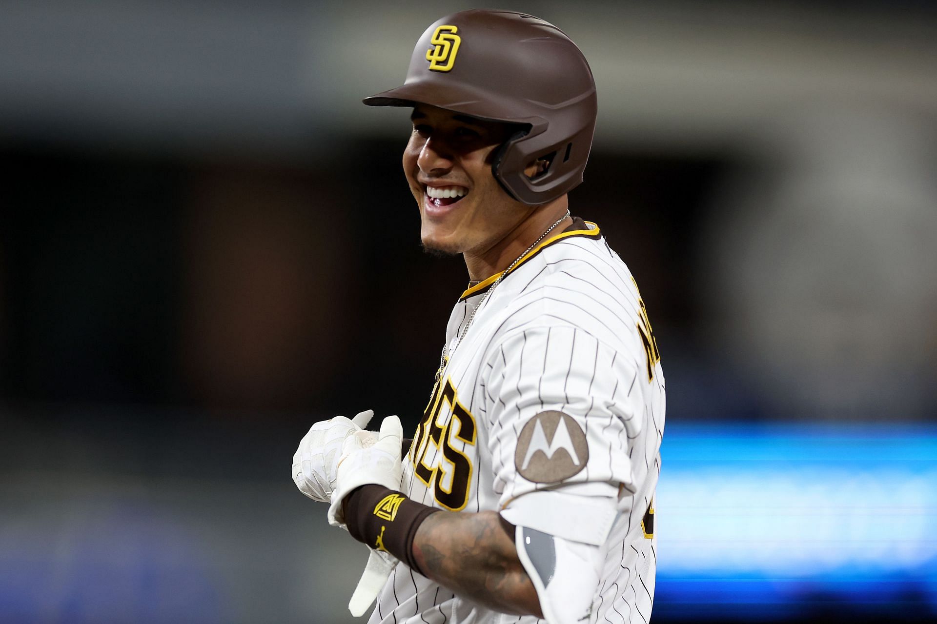 ATLANTA, GA – APRIL 07: San Diego third baseman Manny Machado (13) warms up  prior the start of the MLB game between the San Diego Padres and the  Atlanta Braves on April