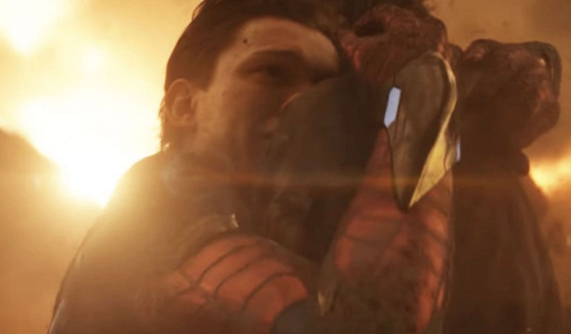 Peter Parker (Tom Holland) disintegrates into dust in the arms of his mentor, Tony Stark (Image via Marvel Studios)