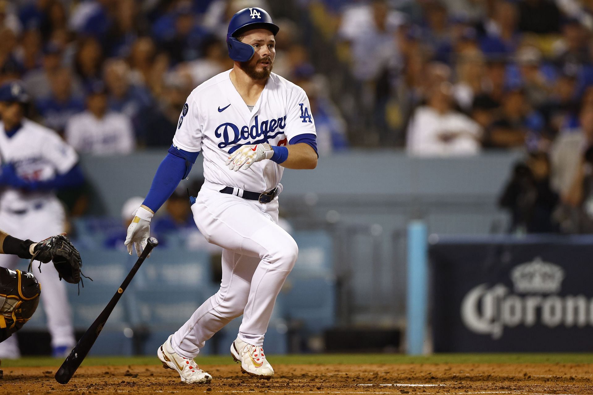 Gavin Lux of the Los Angeles Dodgers hits a two run double in the NLDS against the San Diego Padres at Dodger Stadium