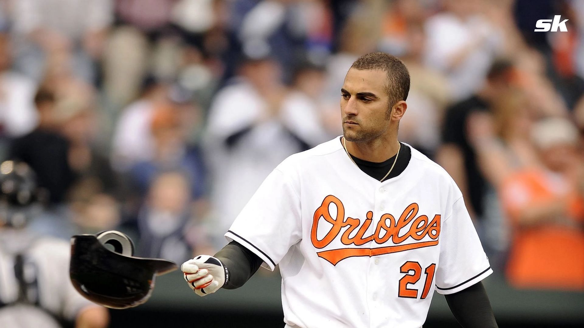 Believe it or not This is Nick Markakis under all that hair. When I saw him  I about died.