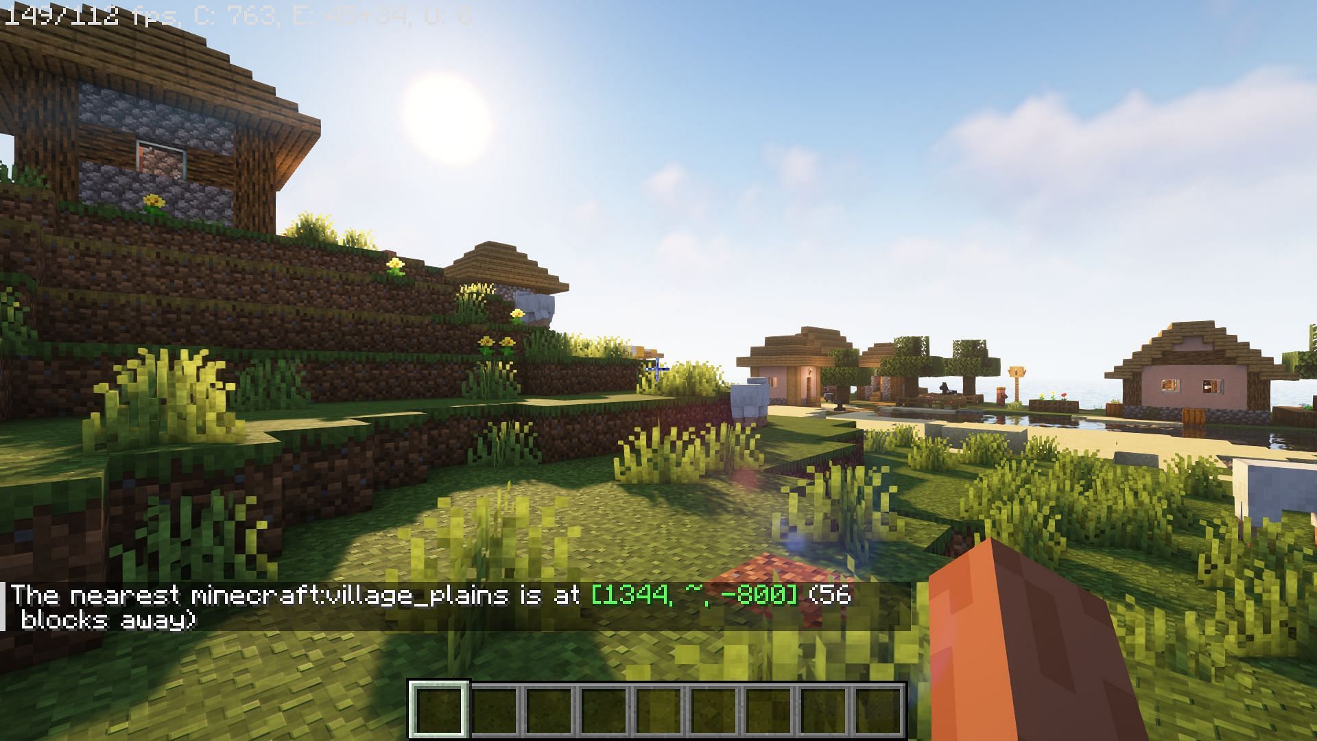 Using the /locate command to find a village (Image via Mojang Studios)