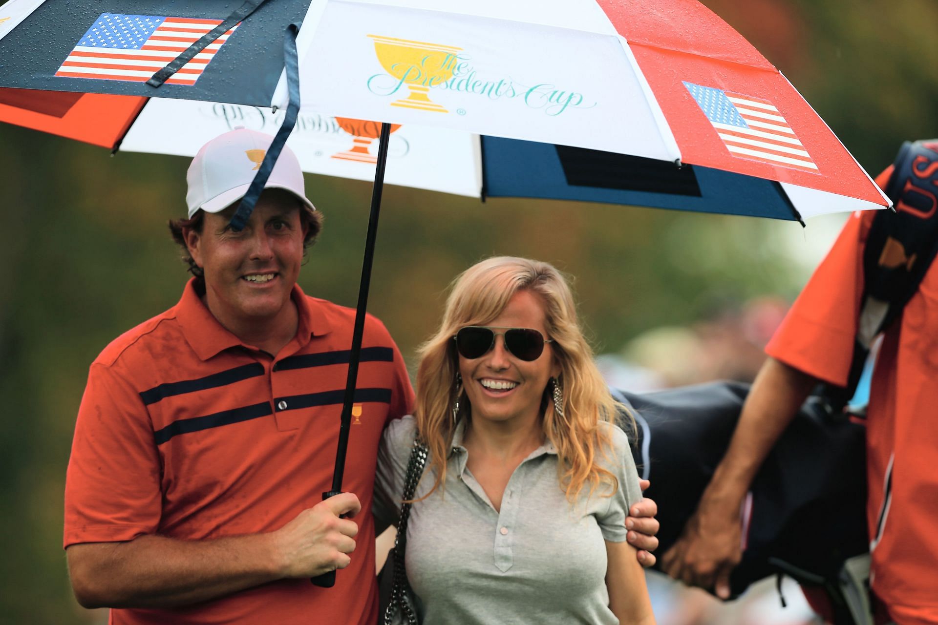 Amy and Phil Mickelson during The Presidents Cup, 2013 (Image via Getty).