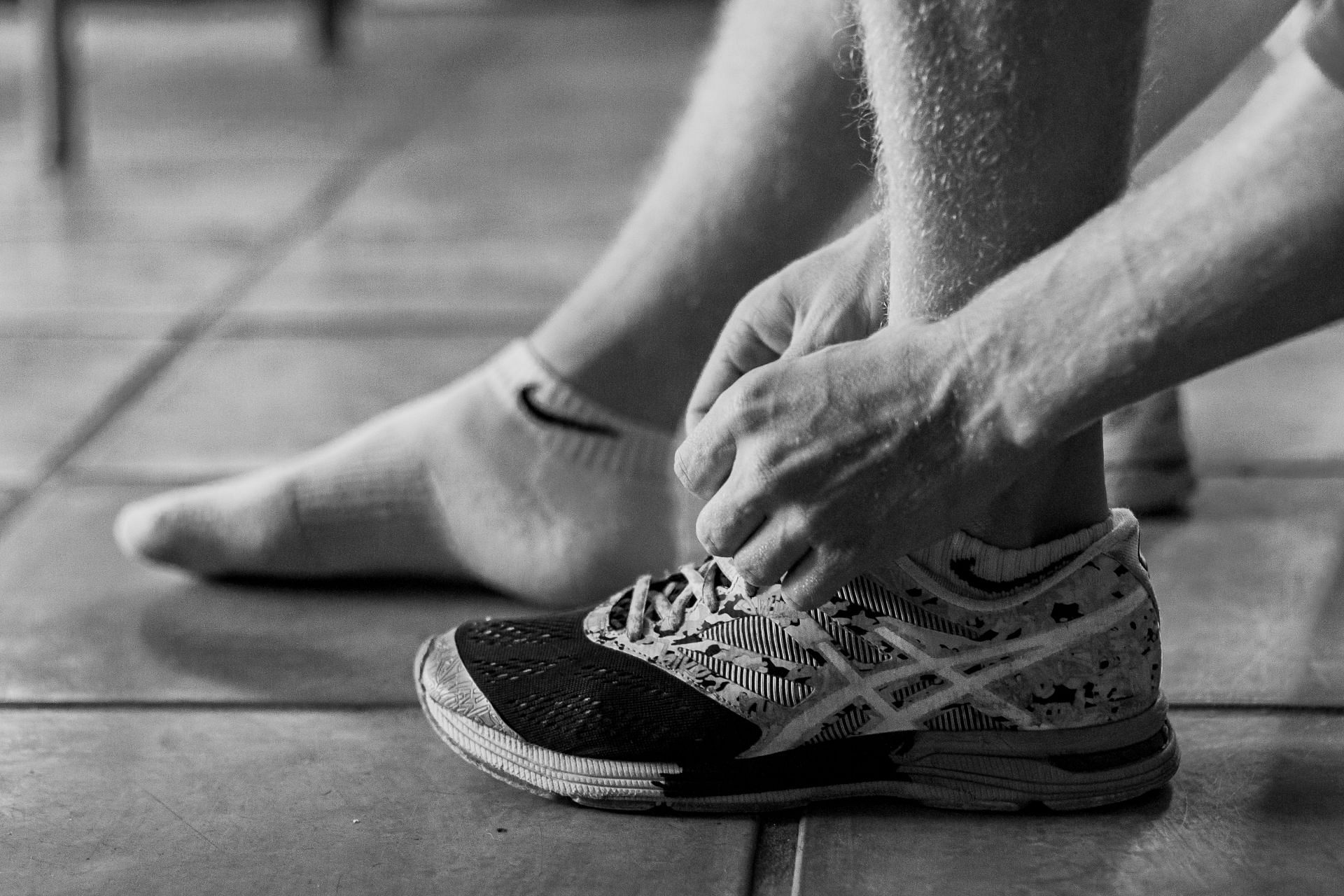 Delaying treatment for an ankle injury can have serious consequences (Image via Unsplash)