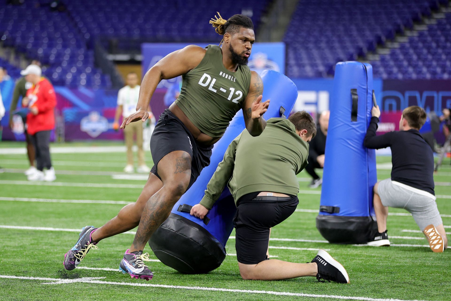 Zacch Pickens of South Carolina participates in a drill during the NFL Combine