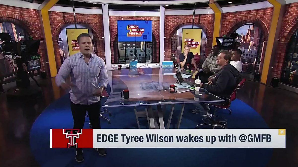 Good Morning Football host Kyle Brandt falls off chair on live TV