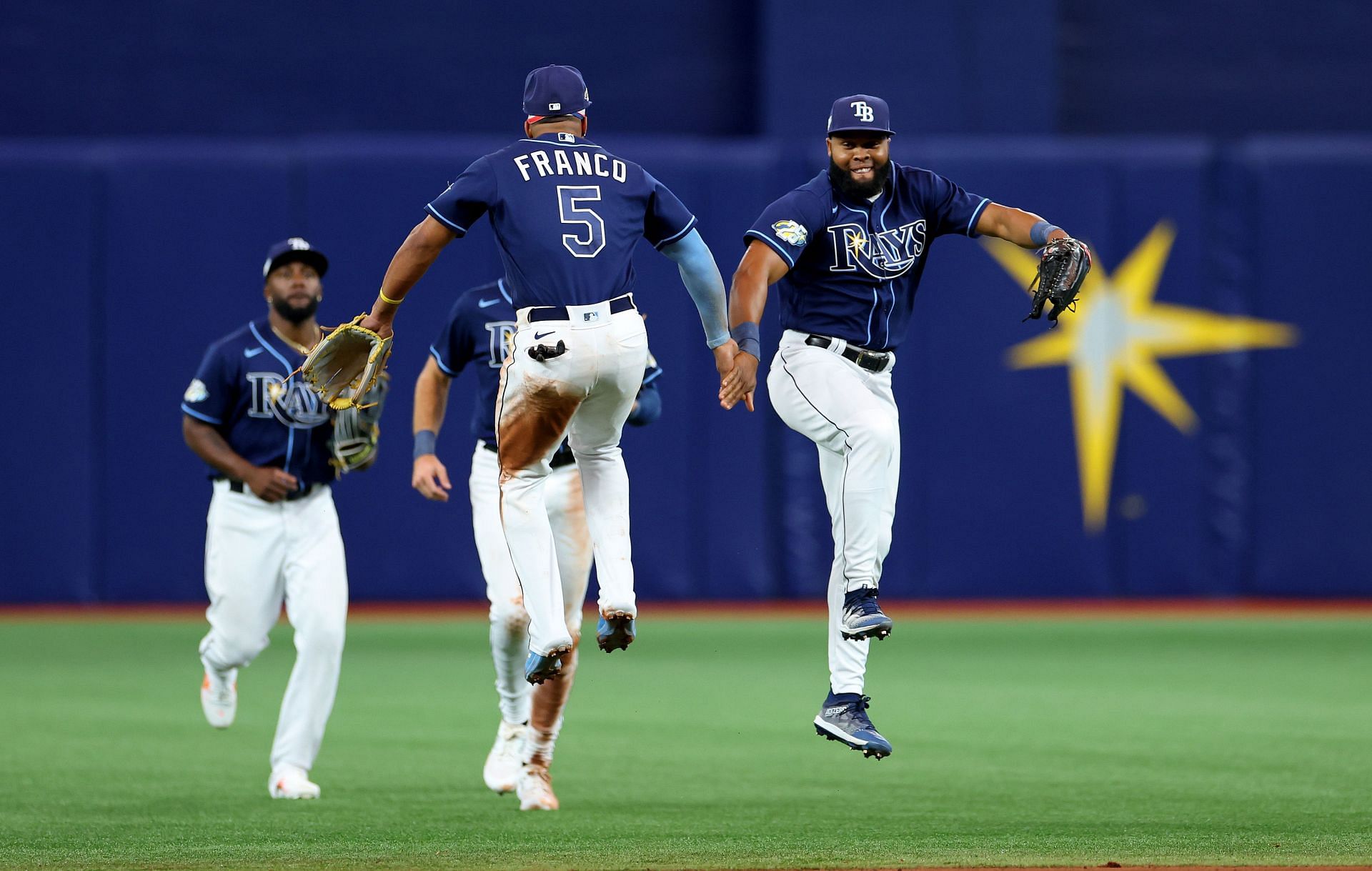 Tampa Bay Rays players celebrate their 12th straight win