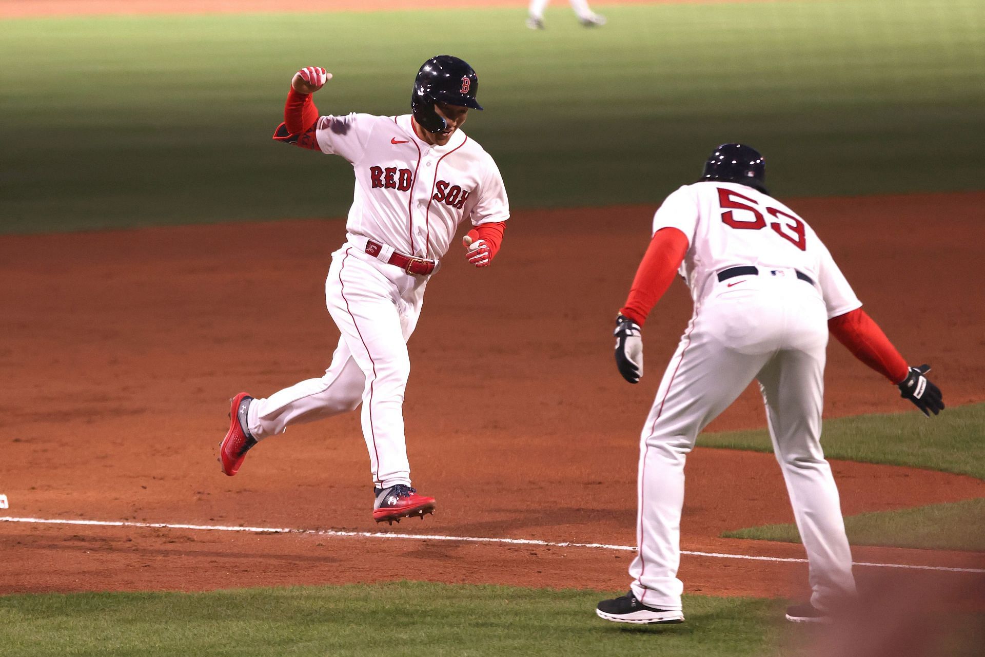 Masataka Yoshida of the Boston Red Sox celebrates after hitting a home run.