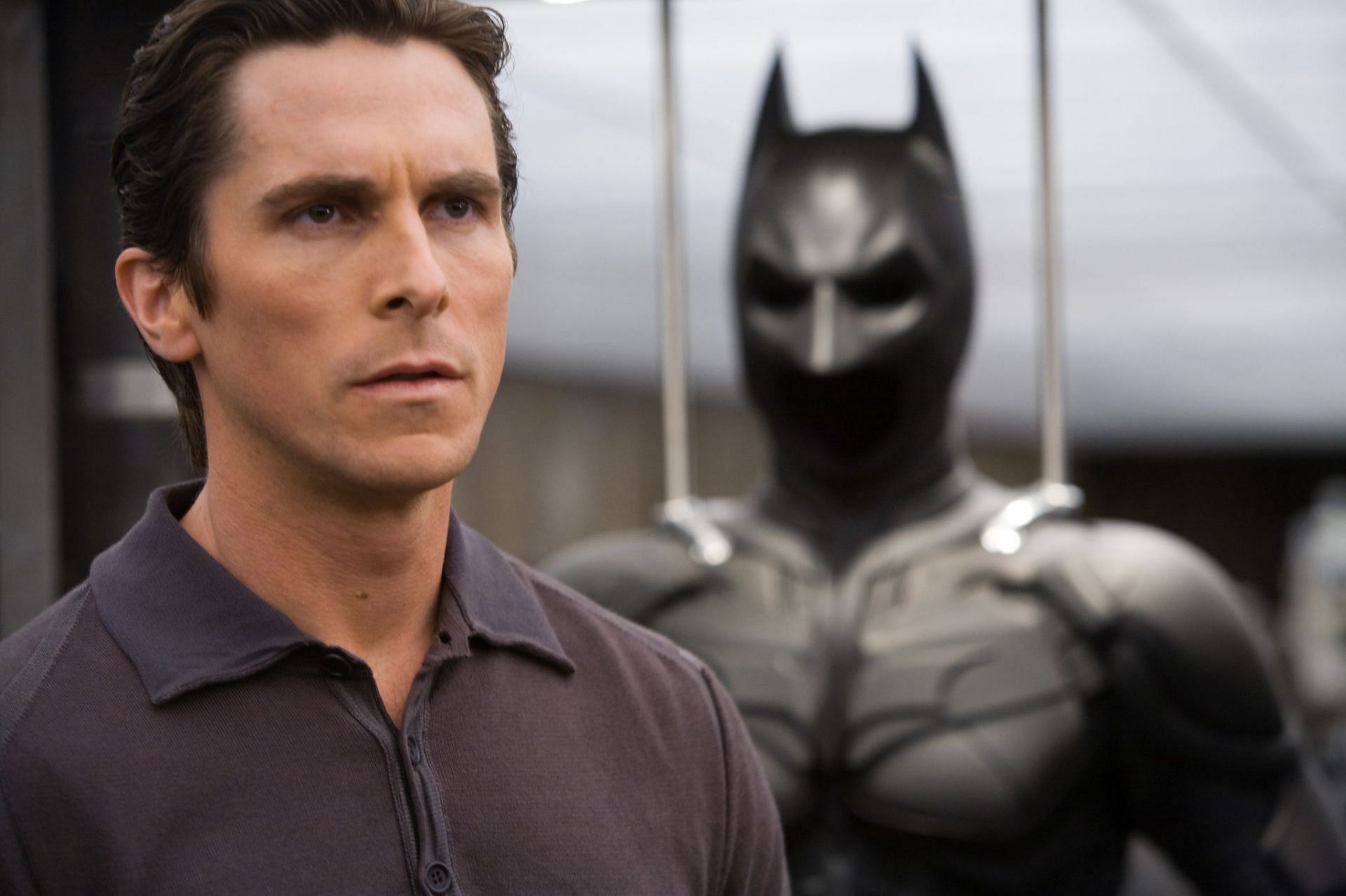 Michael Keaton and Ben Affleck set to star in The Flash&#039;s multiverse Batman cast, while rumors surrounding Christian Bale&#039;s involvement continue to circulate (Image via Warner Bros)