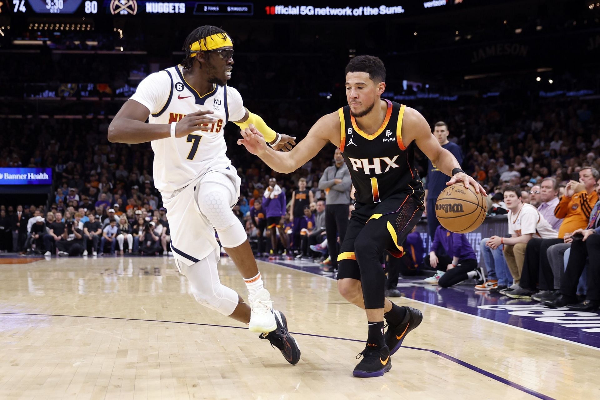 Devin Booker of the Phoenix Suns against the Denver Nuggets.