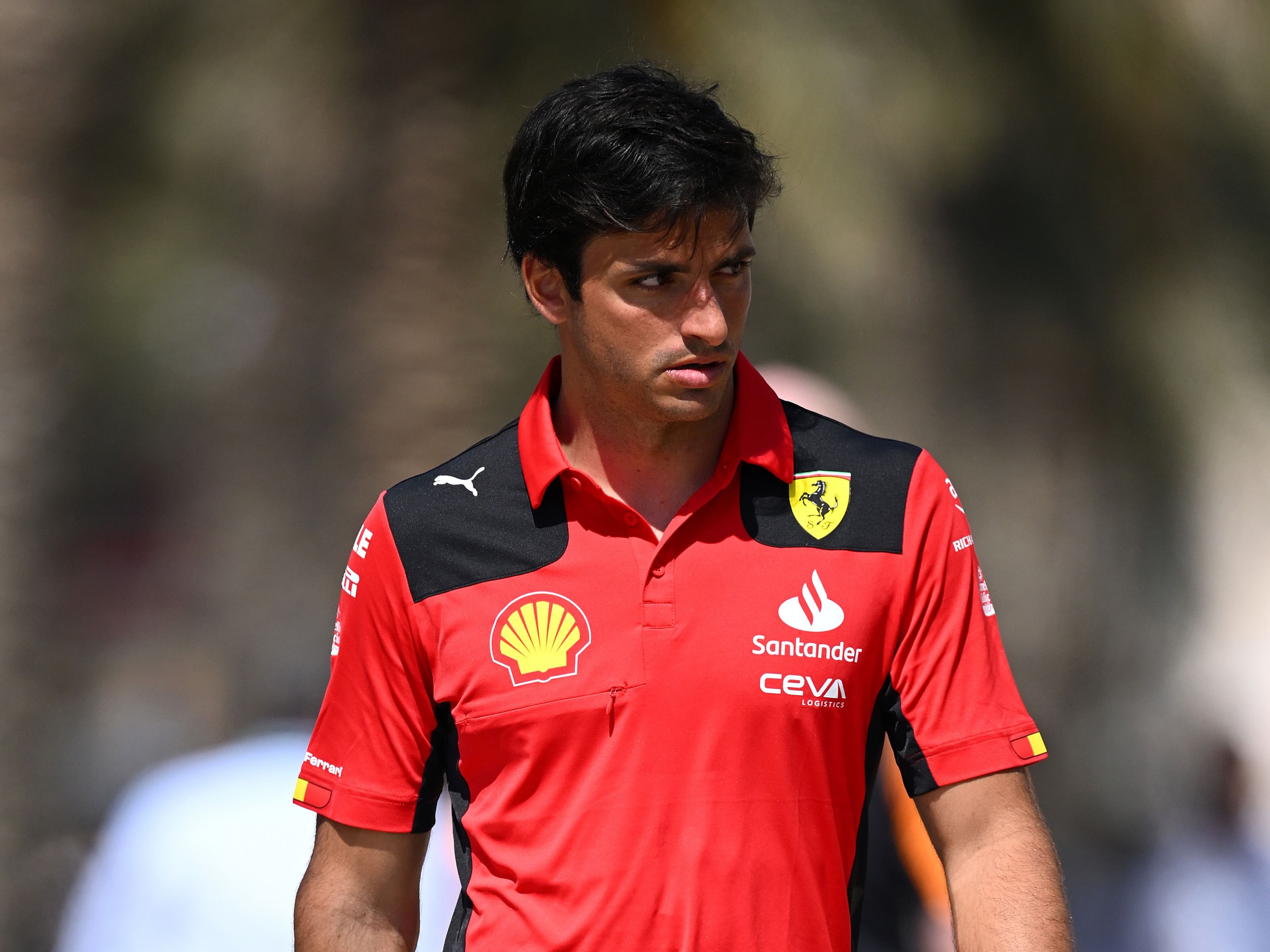 Carlos Sainz walks in the paddock prior to practice ahead of the 2023 F1 Bahrain Grand Prix (Photo by Clive Mason/Getty Images)