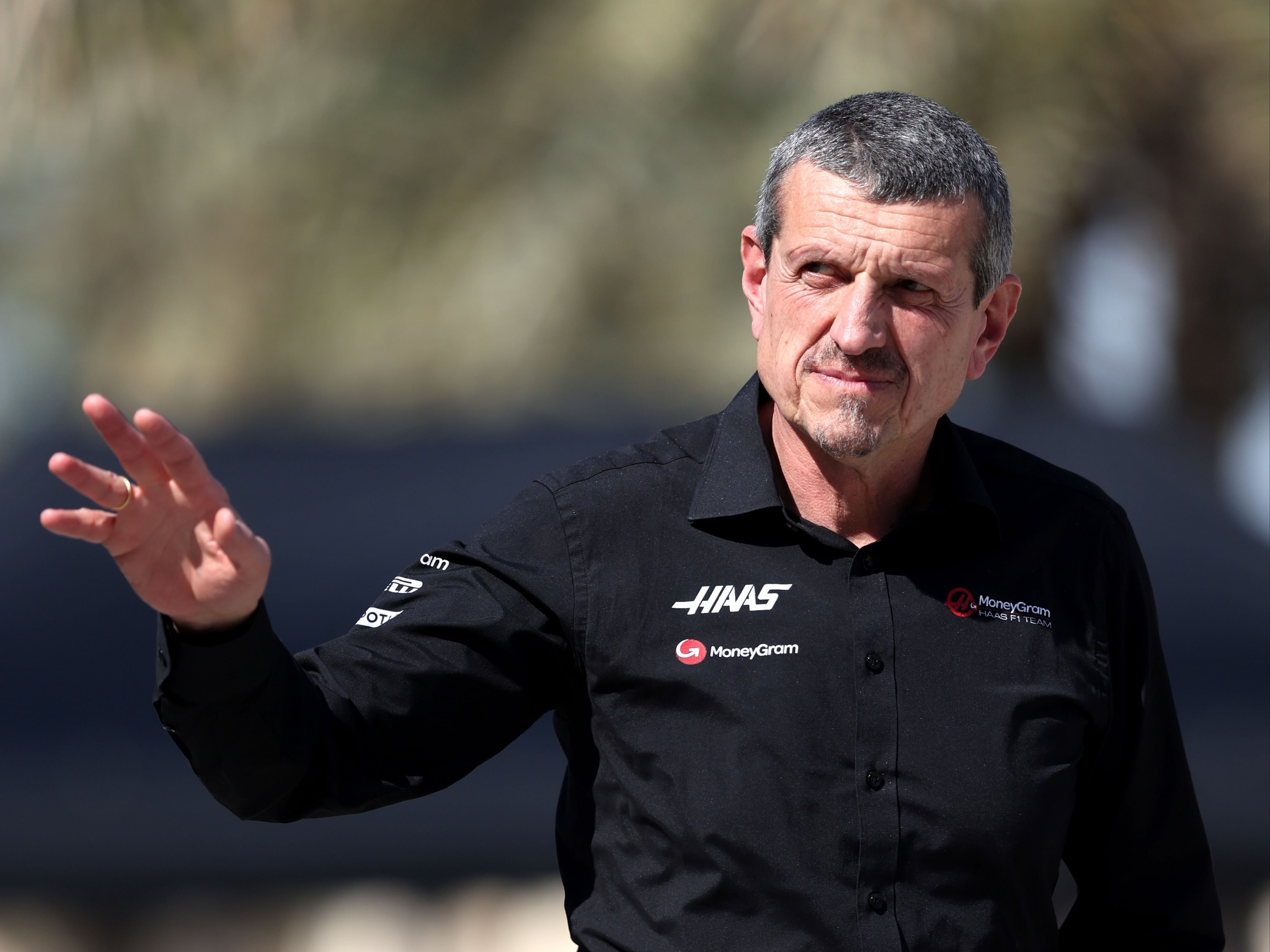 Haas F1 Team Principal Guenther Steiner walks in the paddock during previews ahead of the 2023 F1 Bahrain Grand Prix. (Photo by Lars Baron/Getty Images)