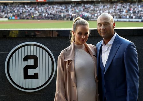 Derek Jeter Ceremony: Jeter and Derek Jeter pose next to his number in Monument Park at Yankee Stadium during the retirement ceremony of Jeter's jersey #2 at Yankee Stadium on May 14, 2017, in the Bronx borough of New York City. (Photo by Elsa/Getty Images)