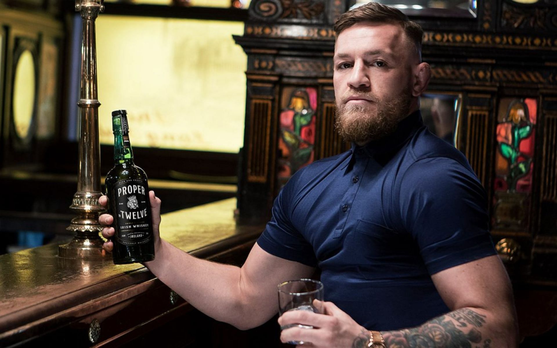 Conor McGregor with a bottle of Proper No. 12 [Image courtesy: @TheMacLife on Twitter]