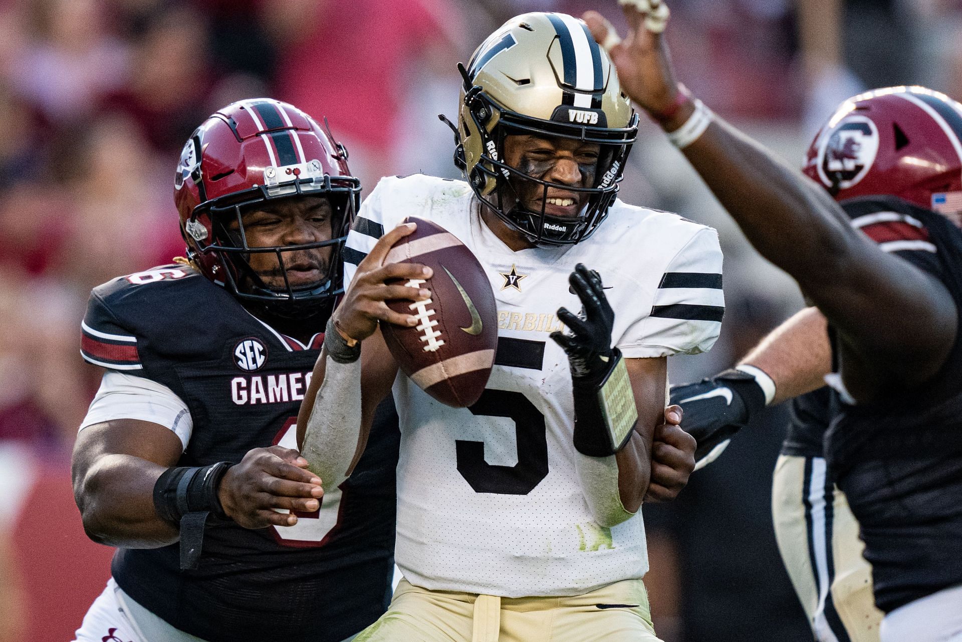 Quarterback Mike Wright #5 of the Vanderbilt Commodores is sacked by defensive lineman Zacch Pickens #6 of the South Carolina Gamecocks 