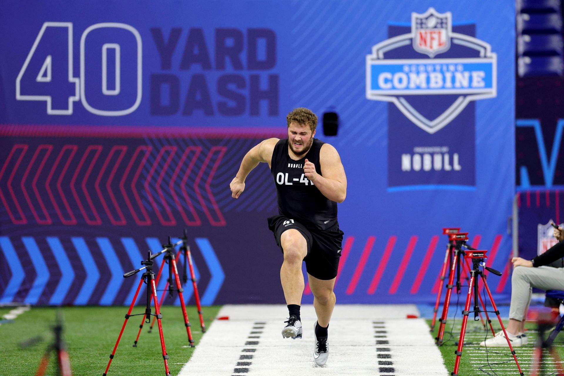 Peter Skoronski of Northwestern participates in the 40-yard dash during the NFL Combine