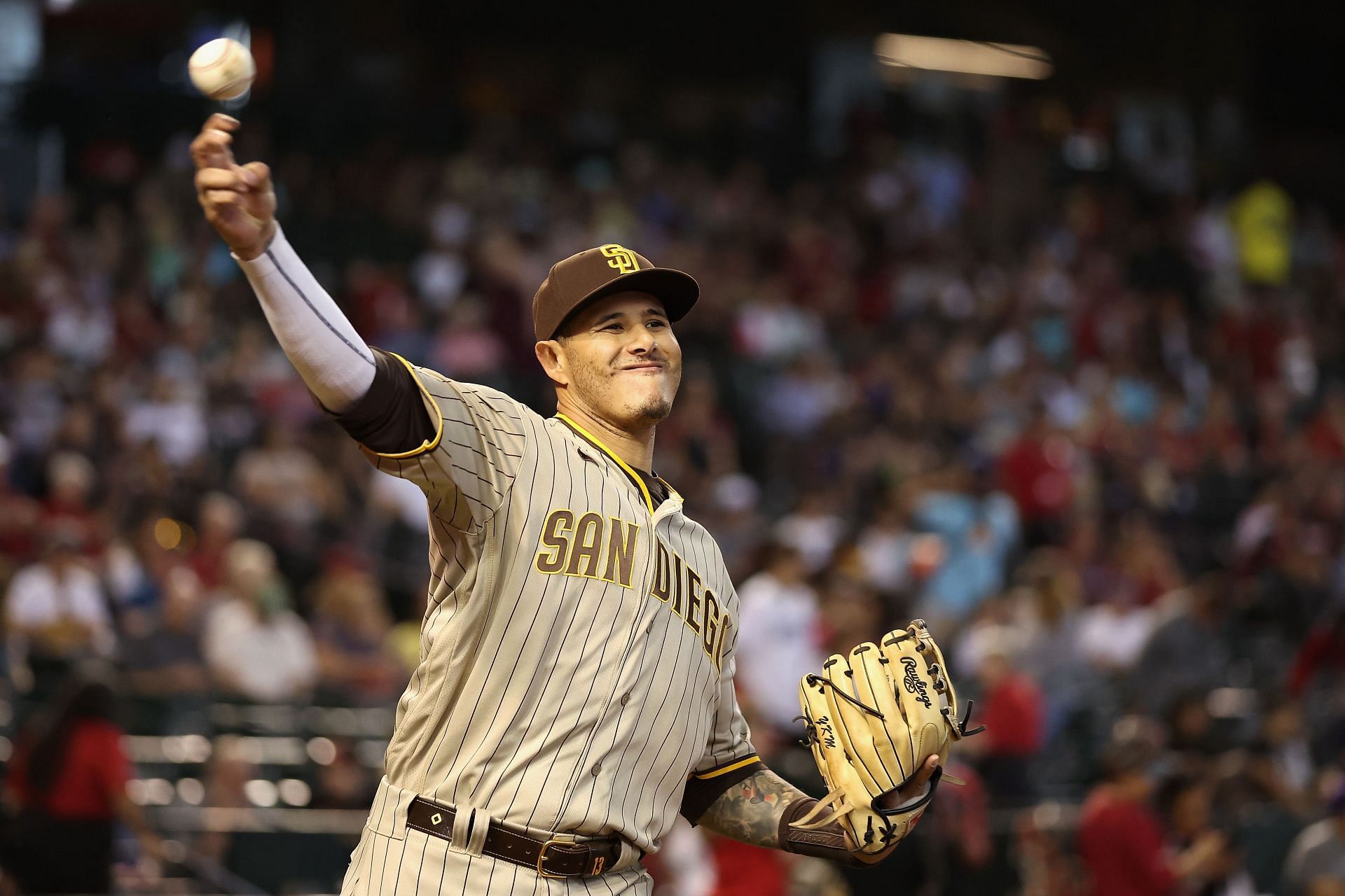 Manny Machado of the San Diego Padres warms-up on field before a game