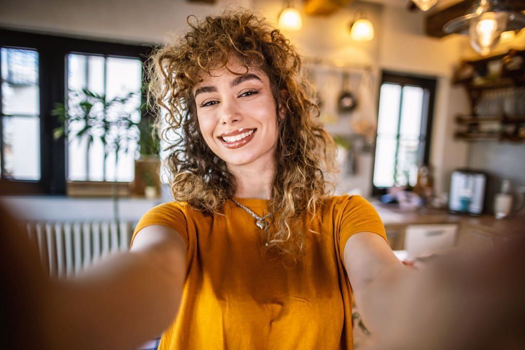 A young women who is busy in self talk(Image via Getty Images)